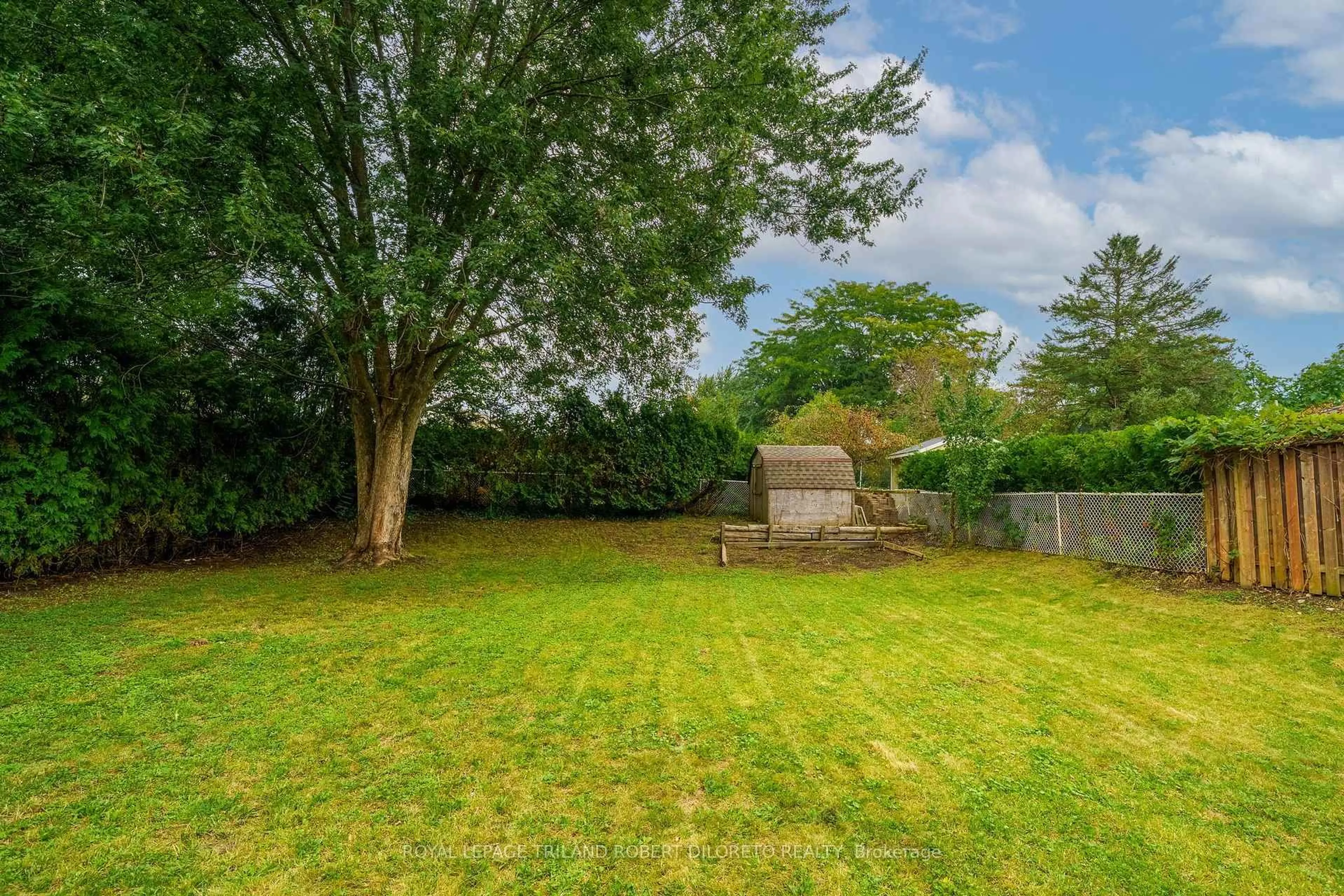 A pic from outside/outdoor area/front of a property/back of a property/a pic from drone, forest/trees view for 654 Grenfell Dr, London North Ontario N5X 2N2