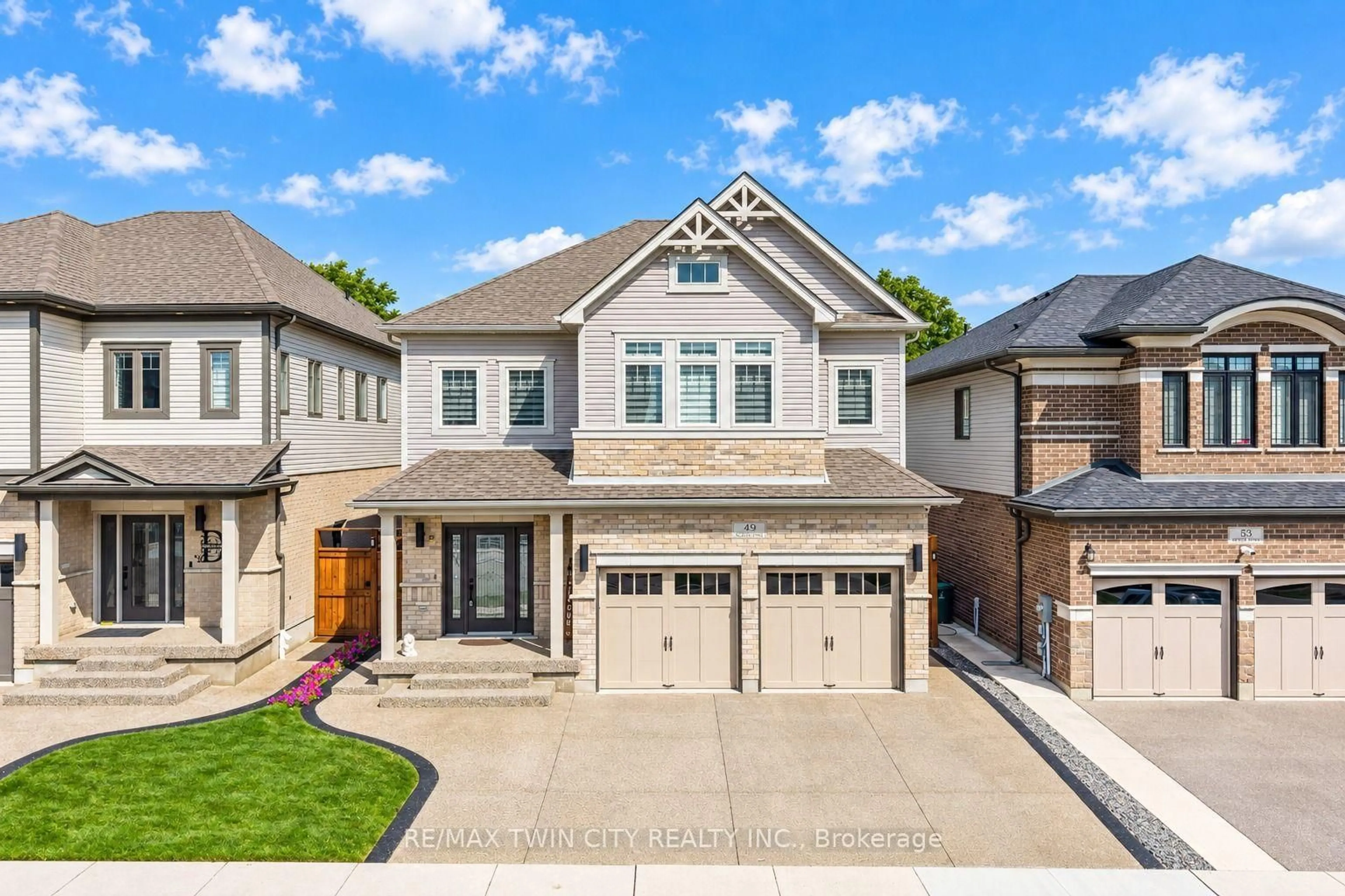 Home with brick exterior material, street for 49 Scots Pine Tr, Kitchener Ontario N2R 0N6