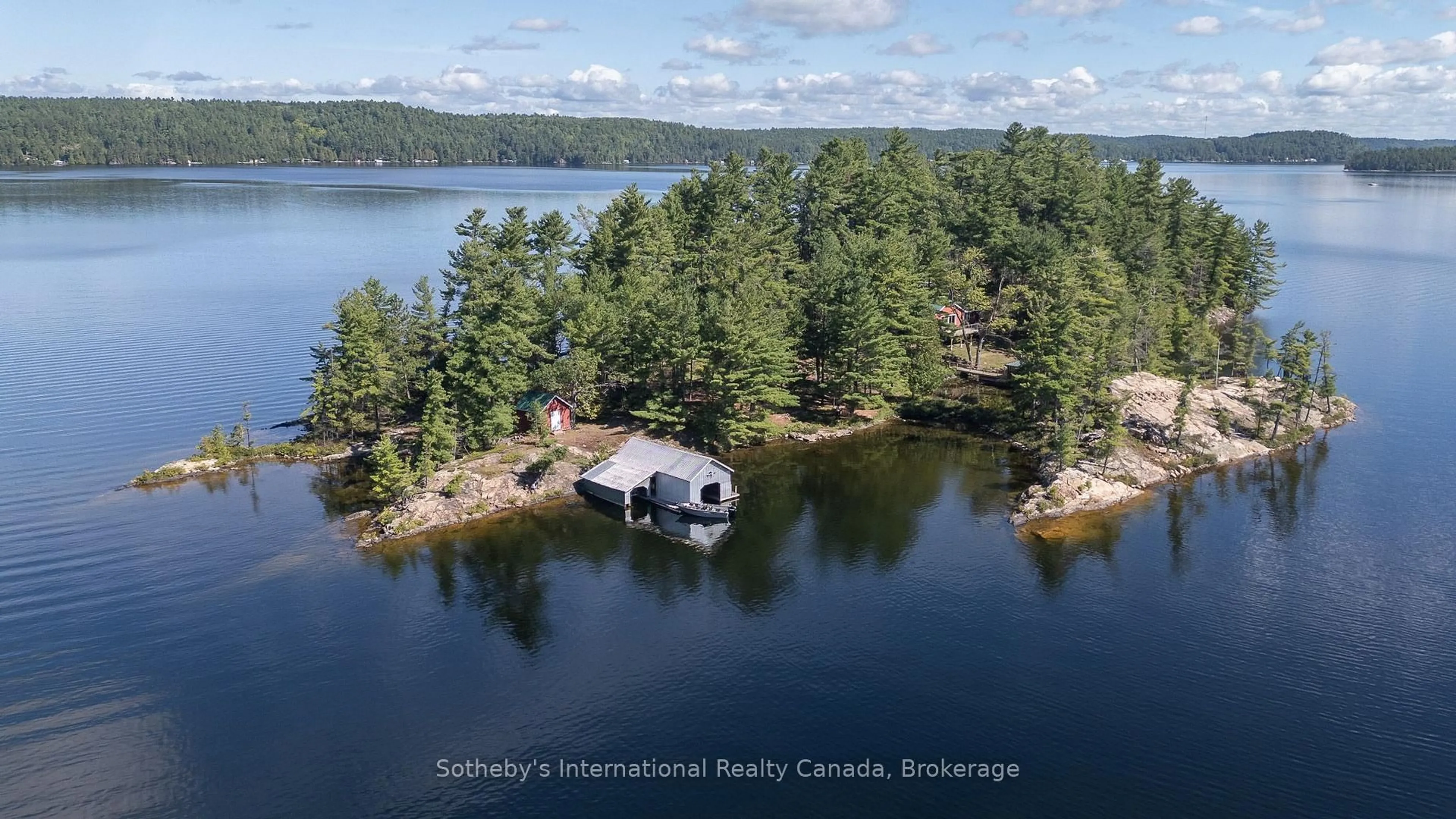A pic from outside/outdoor area/front of a property/back of a property/a pic from drone, water/lake/river/ocean view for 2 Morin Island, Greater Sudbury Ontario P0M 3E0