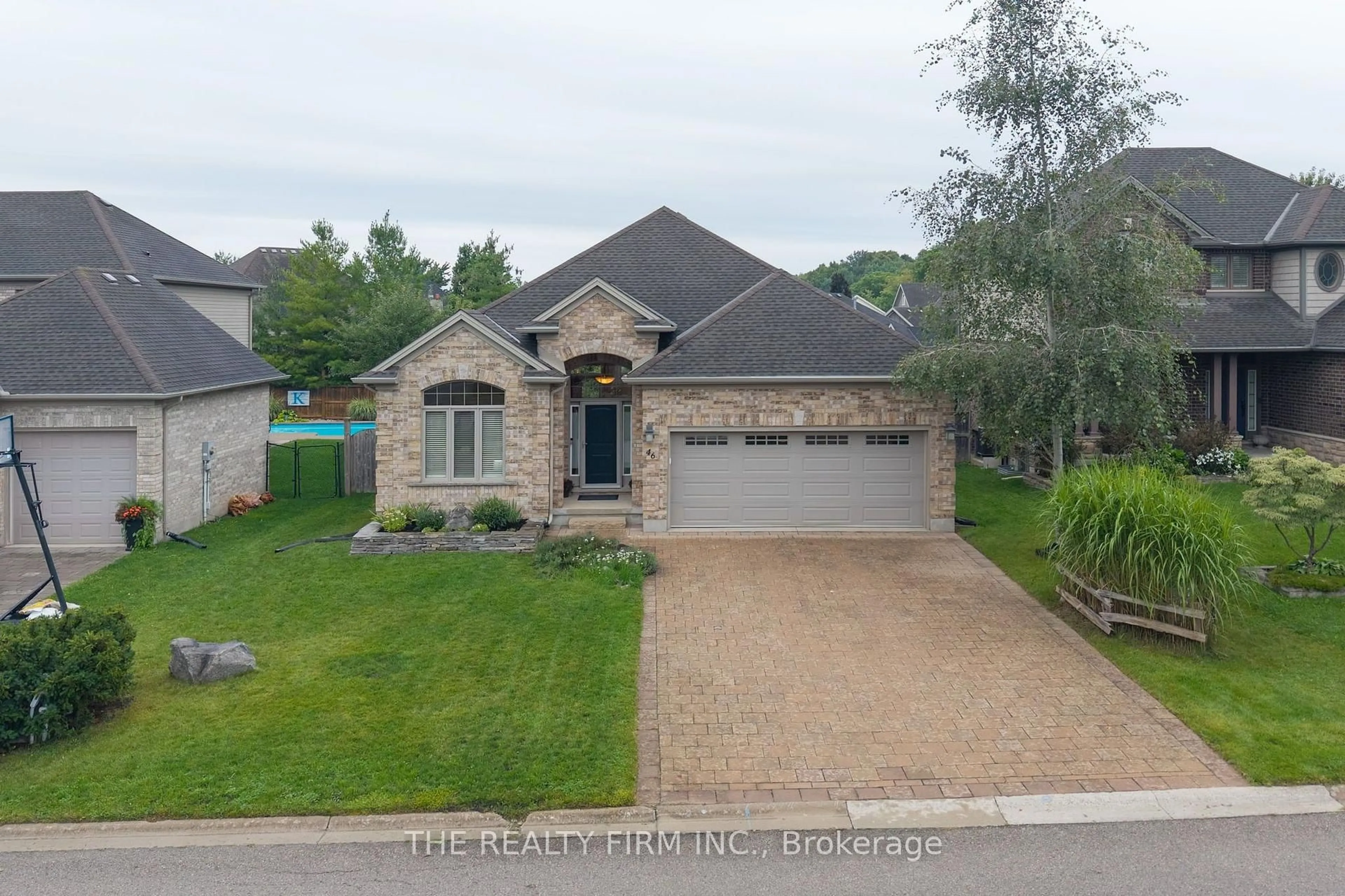 A pic from outside/outdoor area/front of a property/back of a property/a pic from drone, street for 46 Ashwood Cres, Middlesex Centre Ontario N0M 2A0