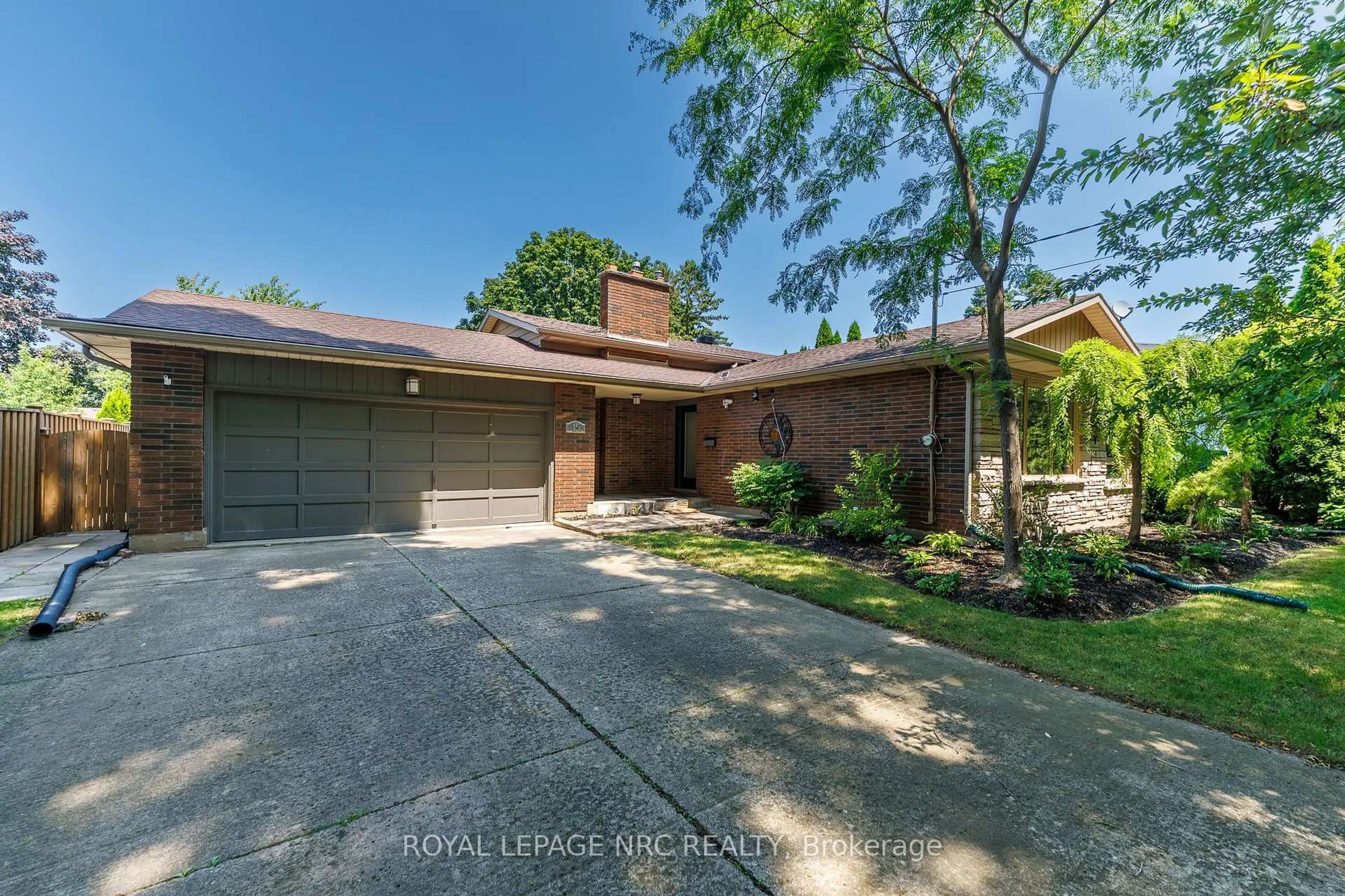 Home with brick exterior material, street for 15 Black Friars Rd, St. Catharines Ontario L2N 2M8