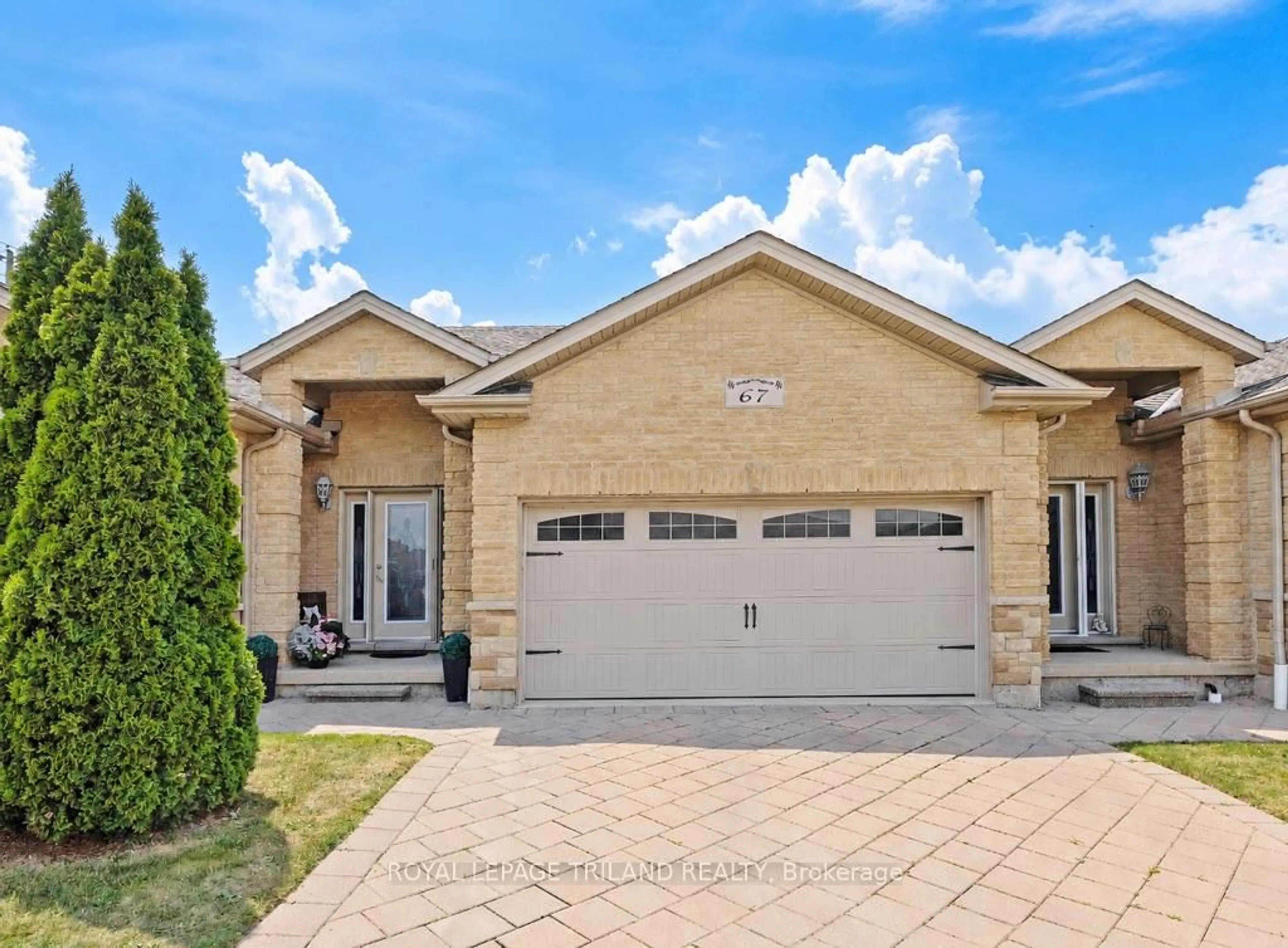 Home with brick exterior material, street for 70 Tanoak Dr #67, London North Ontario N6G 5R3