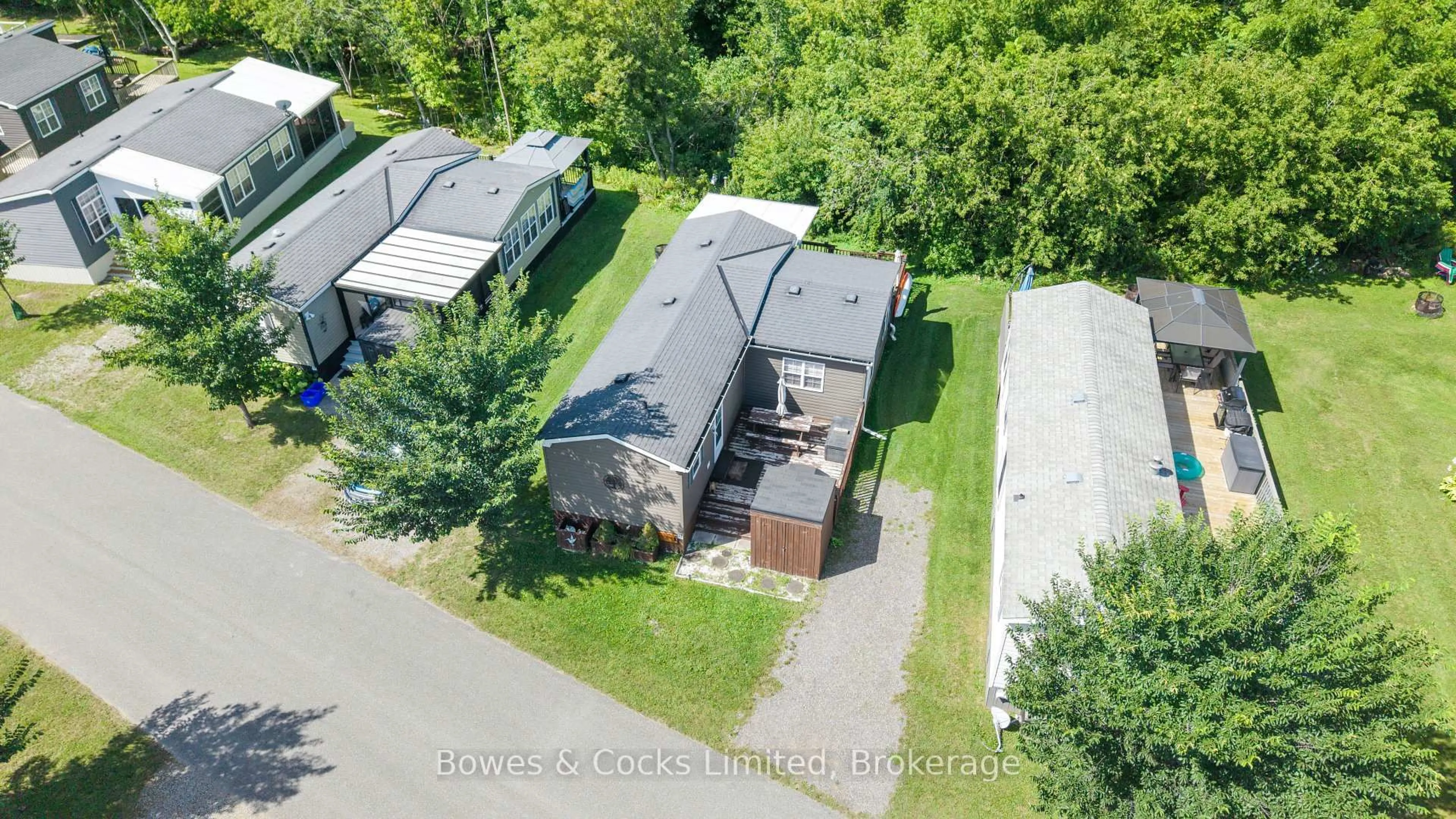 A pic from outside/outdoor area/front of a property/back of a property/a pic from drone, street for 1235 Villiers Line #15 The Point Dr., Otonabee-South Monaghan Ontario K0L 2G0