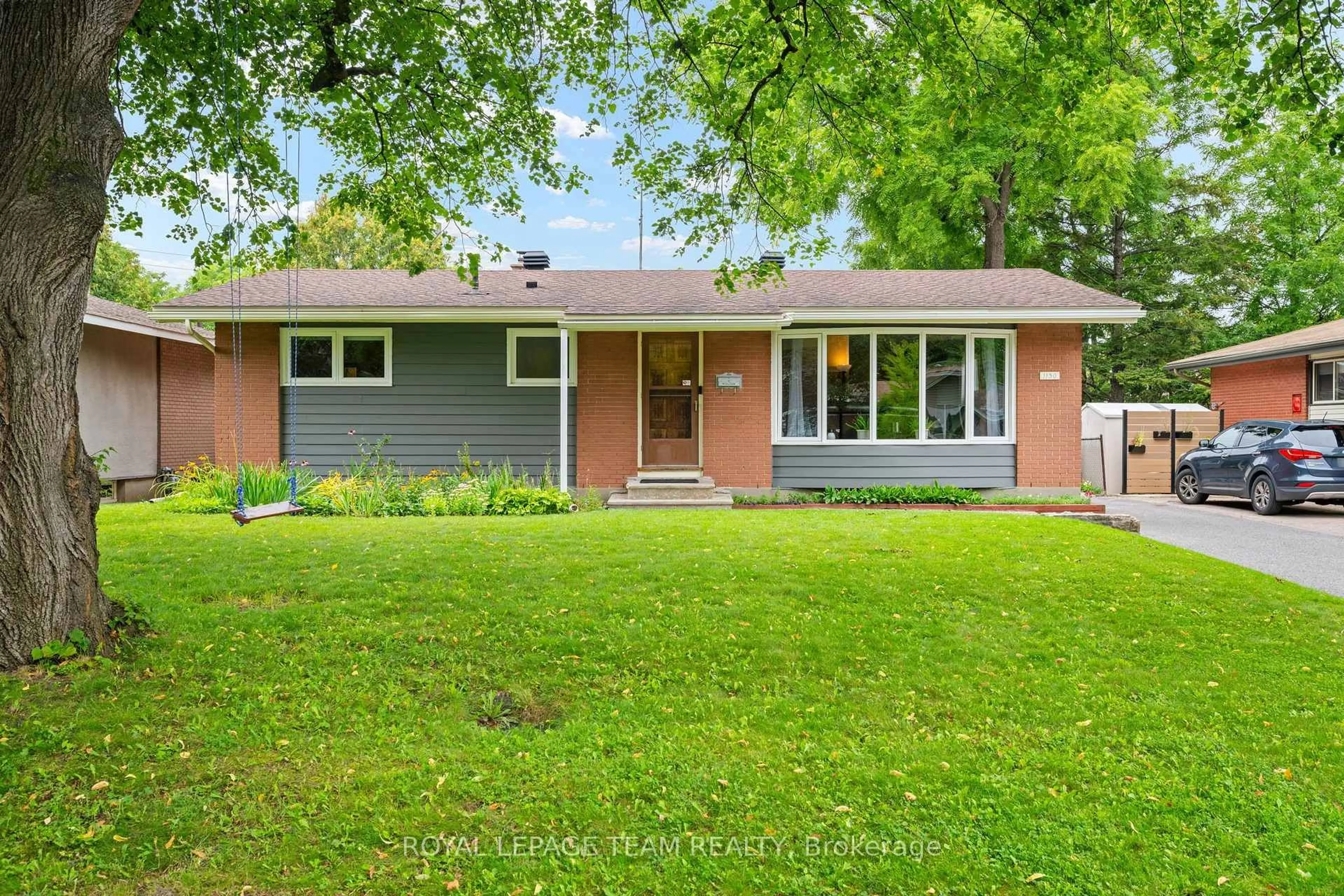 Home with brick exterior material, street for 1130 Parkway Dr, Ottawa Ontario K2C 2W2