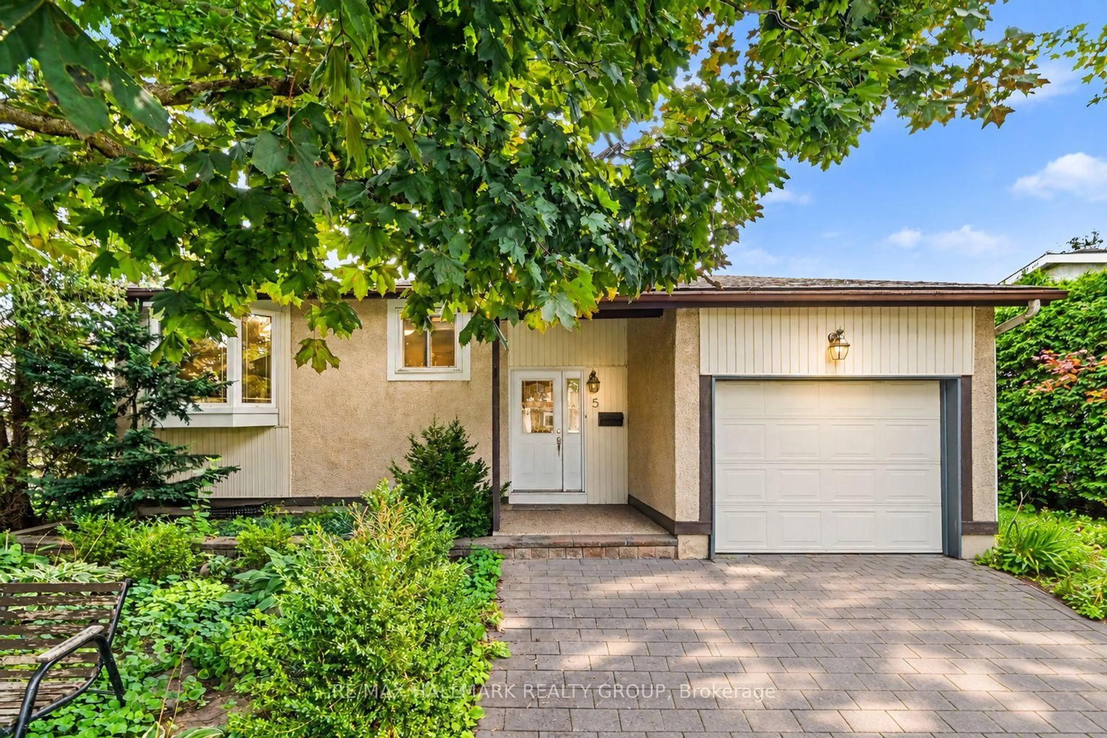 Home with brick exterior material, street for 5 Lansfield Way, Ottawa Ontario K2G 3V7