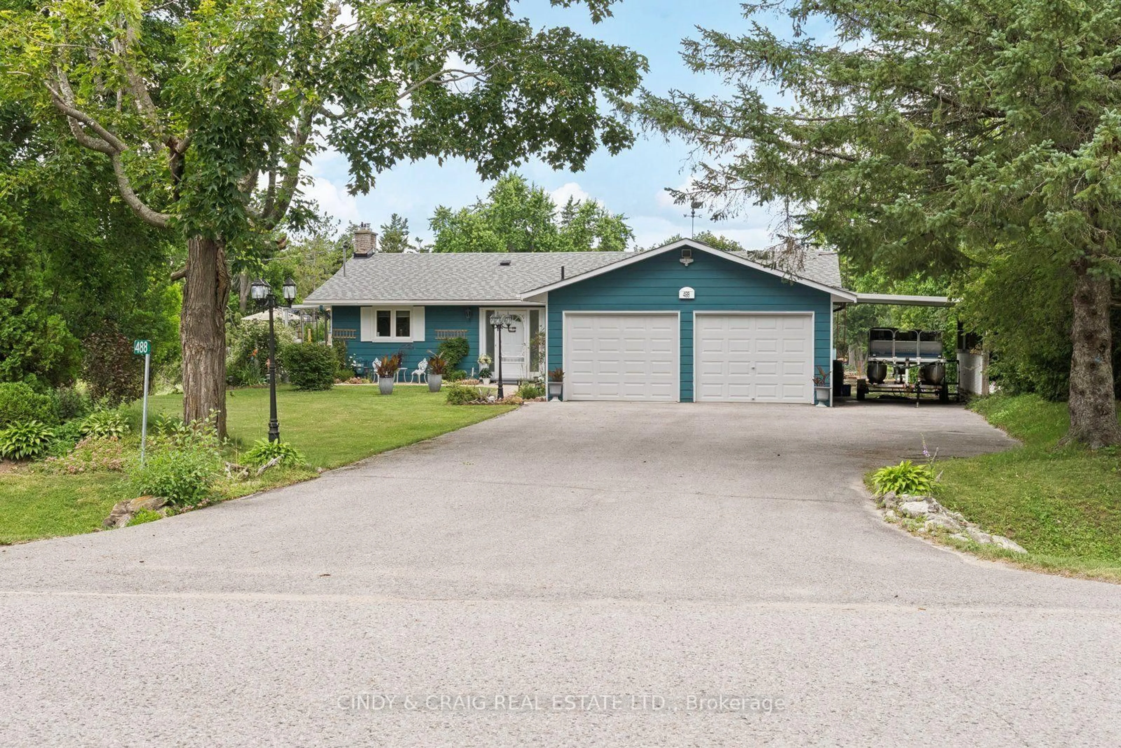 Home with vinyl exterior material, street for 488 MCCONNELL Dr, Selwyn Ontario K9J 6X3