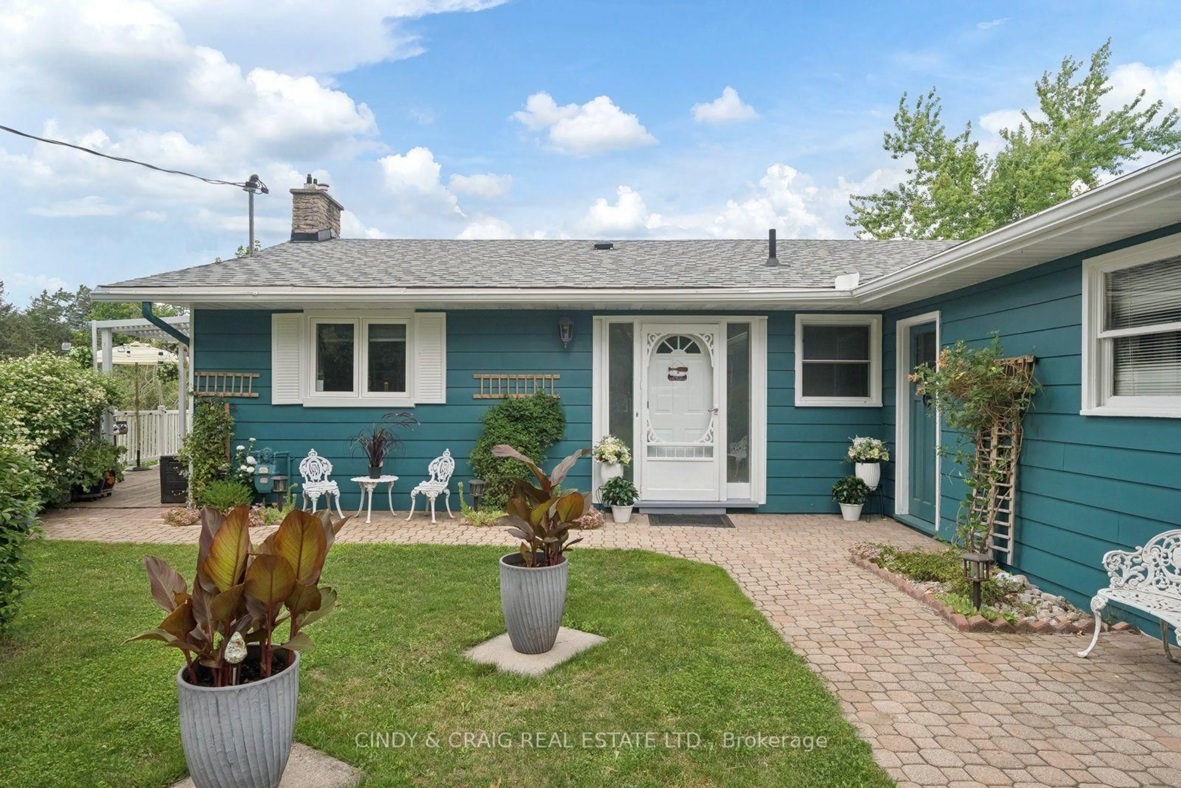 Home with vinyl exterior material, street for 488 MCCONNELL Dr, Selwyn Ontario K9J 6X3