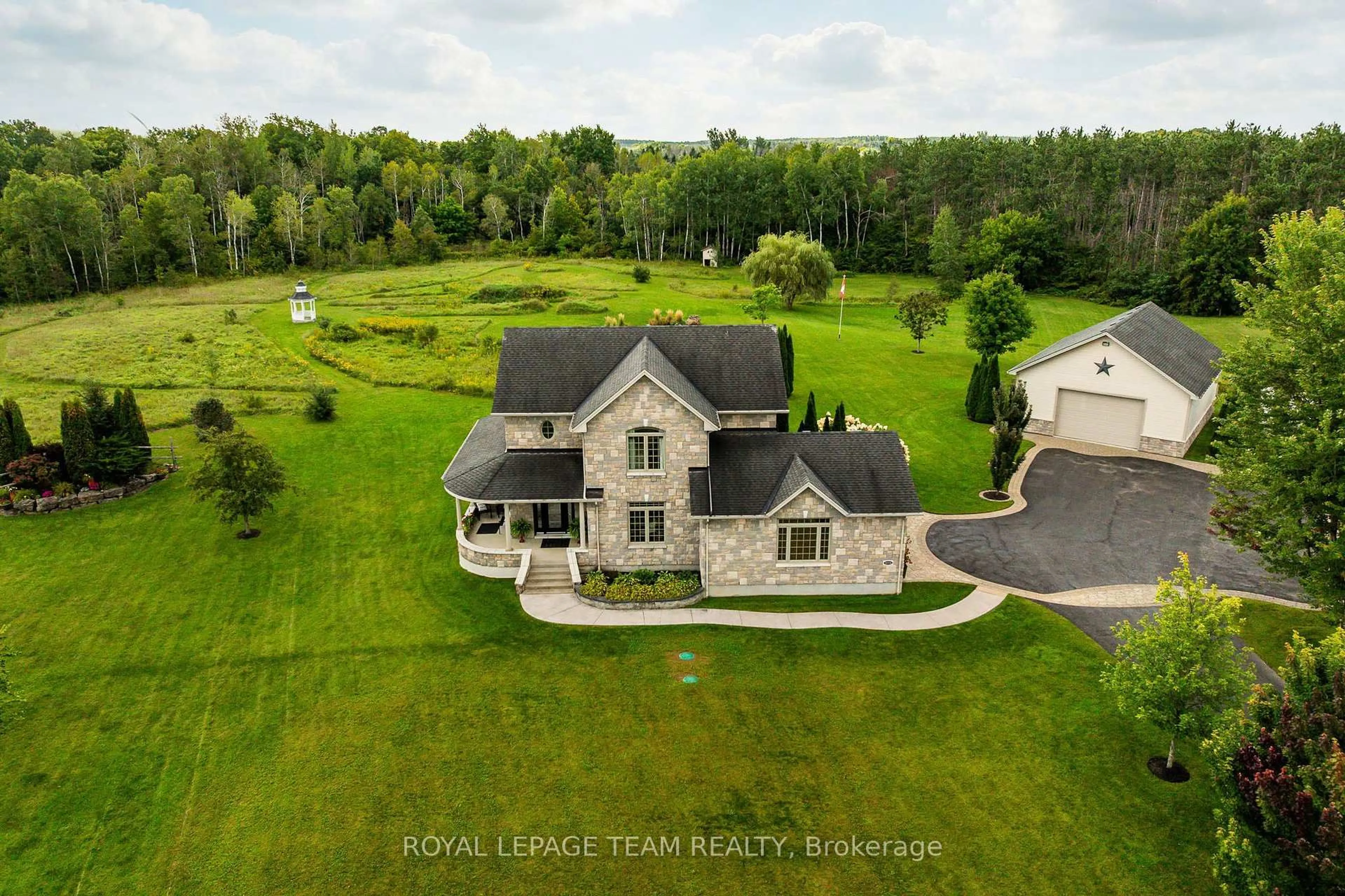 A pic from outside/outdoor area/front of a property/back of a property/a pic from drone, water/lake/river/ocean view for 61 Balmoral St, North Grenville Ontario K0G 1J0