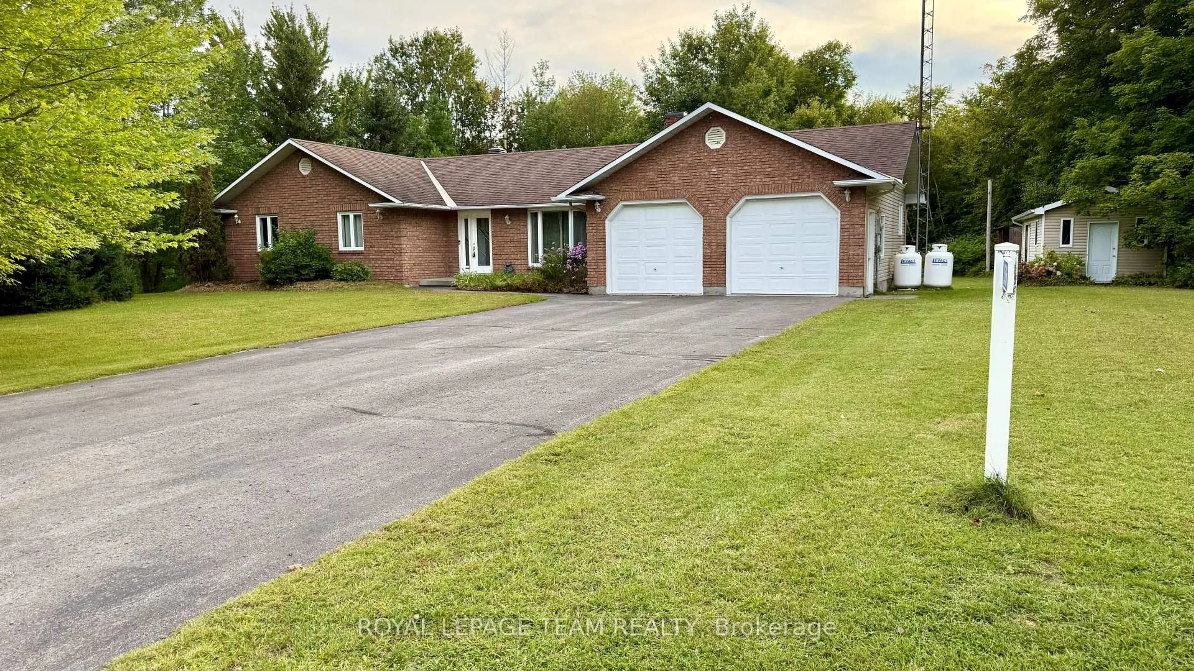 Home with brick exterior material, street for 2506 Rollin Rd, Clarence-Rockland Ontario K0A 3N0