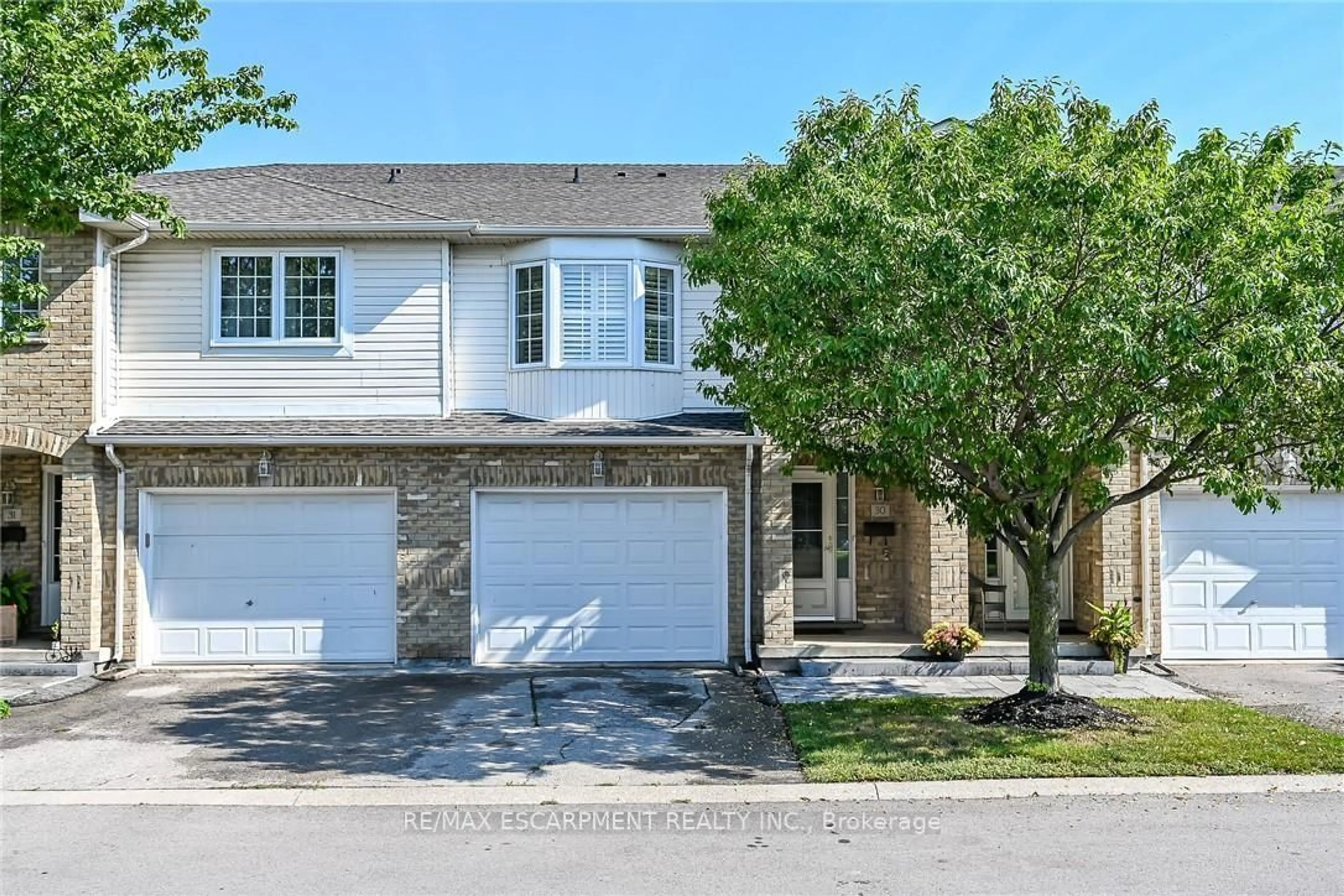 Home with brick exterior material, street for 485 Green Rd #30, Hamilton Ontario L8E 6A8