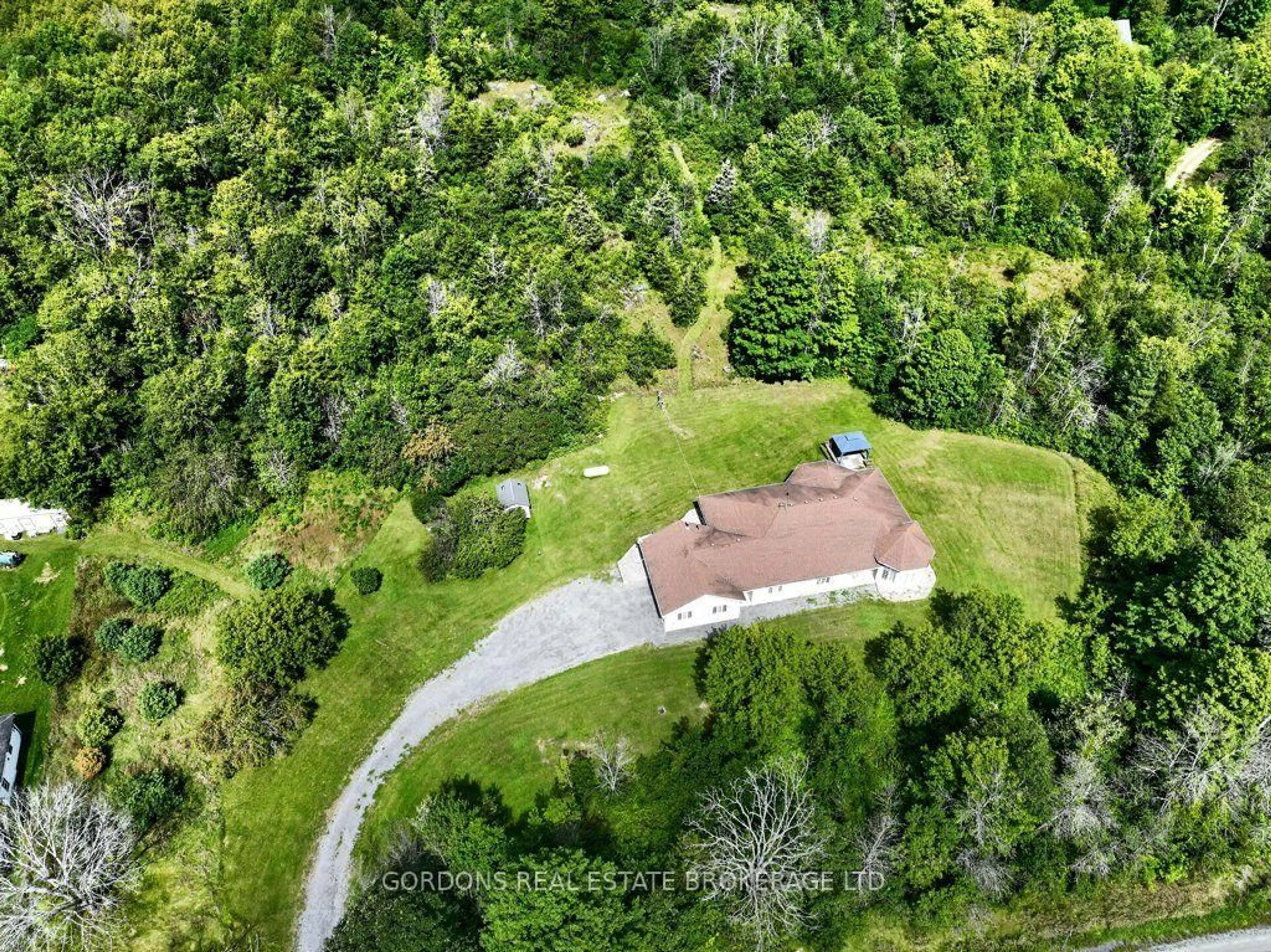 A pic from outside/outdoor area/front of a property/back of a property/a pic from drone, forest/trees view for 1069 County 14 Rd, Kaladar Ontario K0K 1Z0
