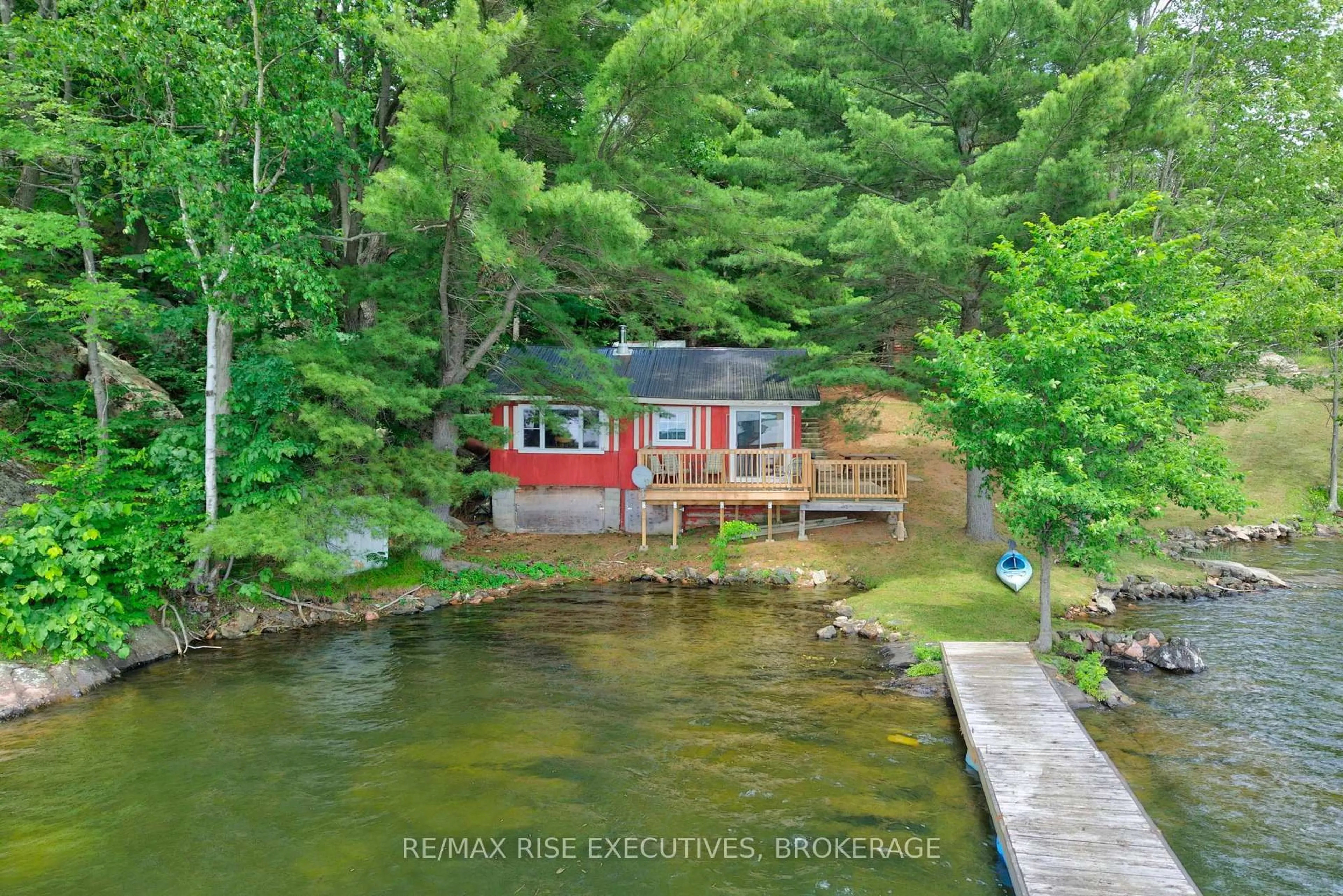 A pic from outside/outdoor area/front of a property/back of a property/a pic from drone, water/lake/river/ocean view for 90 East Shore Lane, Tichborne Ontario K0H 2V0
