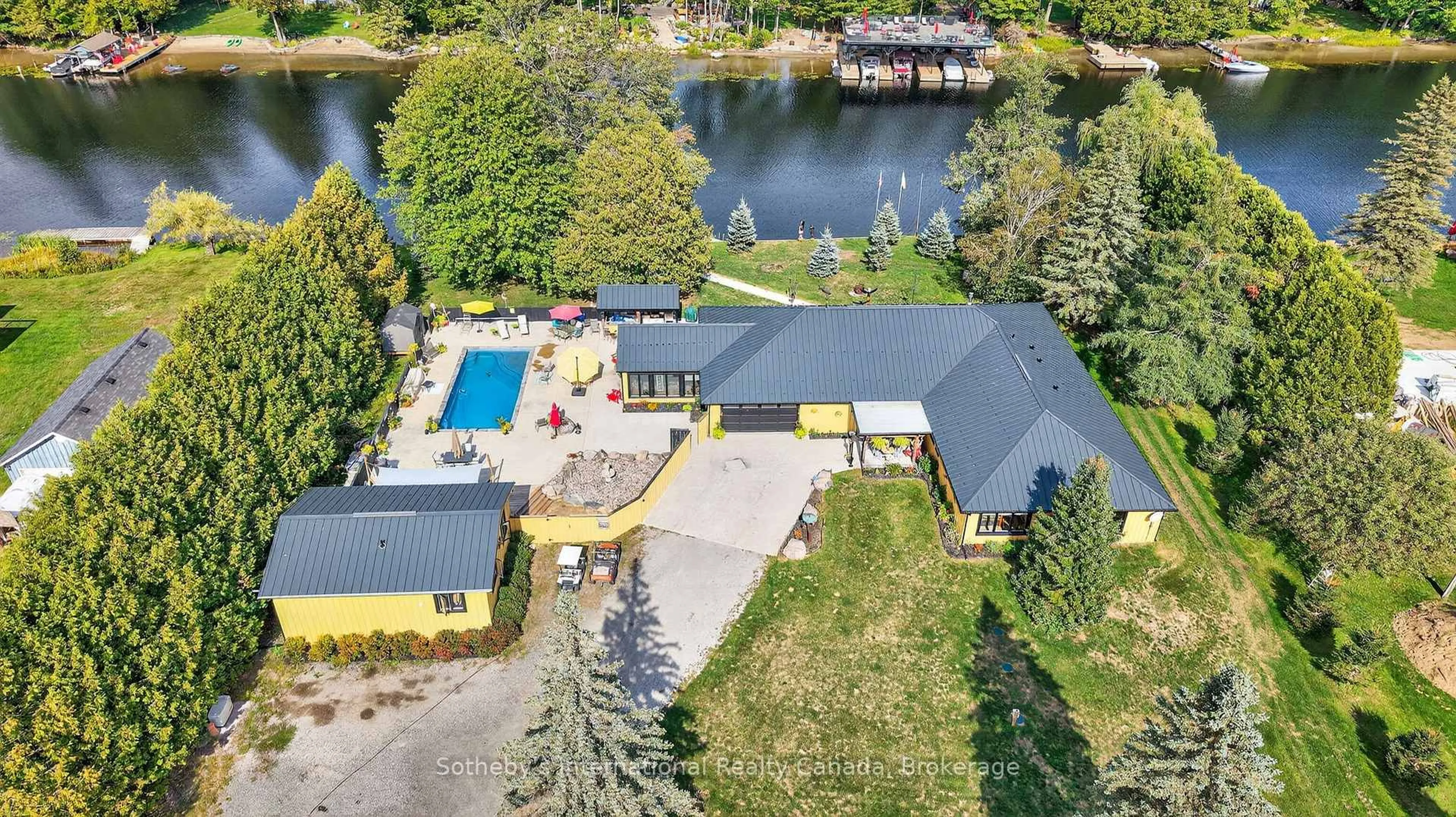 A pic from outside/outdoor area/front of a property/back of a property/a pic from drone, water/lake/river/ocean view for 1082 Beaumont Farm Rd, Bracebridge Ontario P1L 1X2