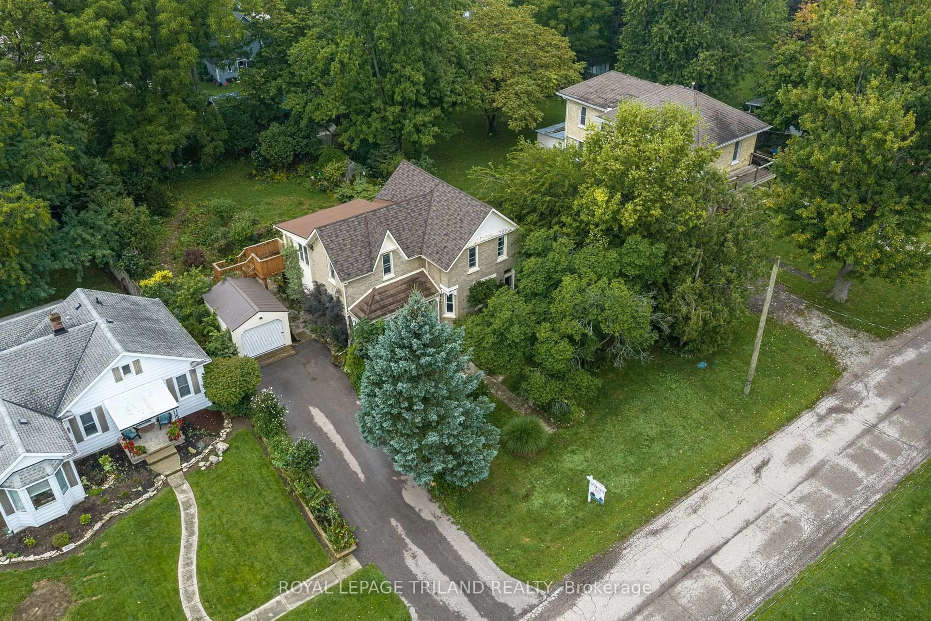 A pic from outside/outdoor area/front of a property/back of a property/a pic from drone, street for 3289 River St, Brooke-Alvinston Ontario N0N 1A0