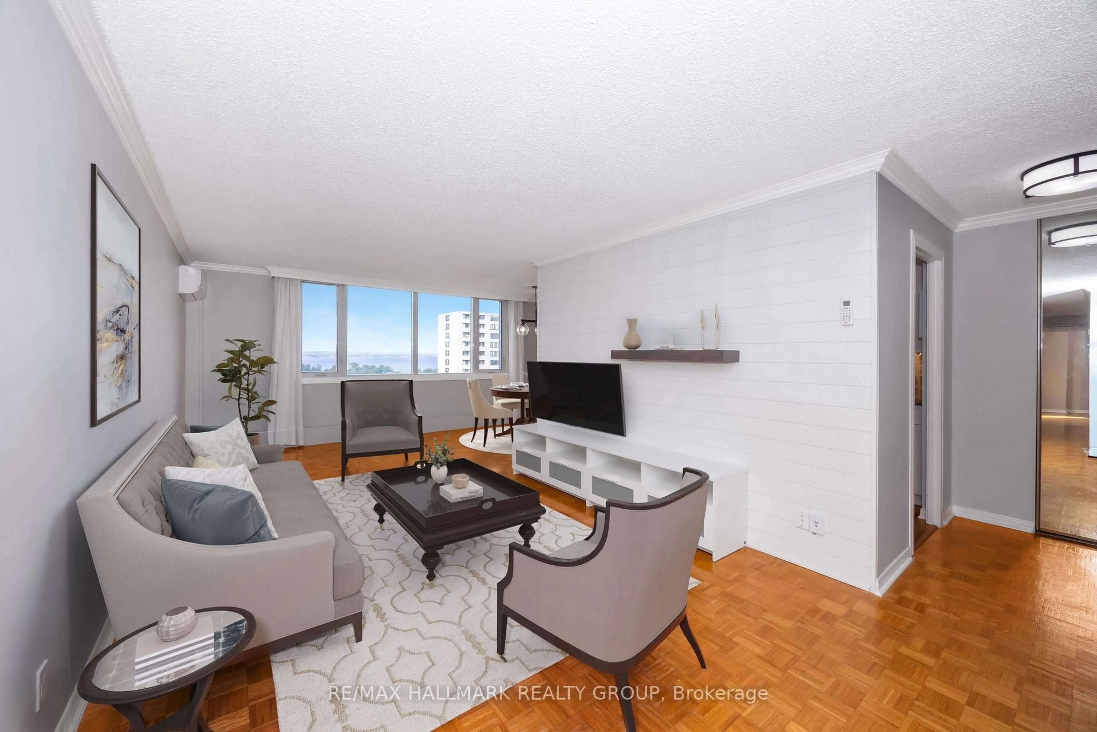 Living room with furniture, wood/laminate floor for 2625 Regina St #1706, Ottawa Ontario K2B 5W8