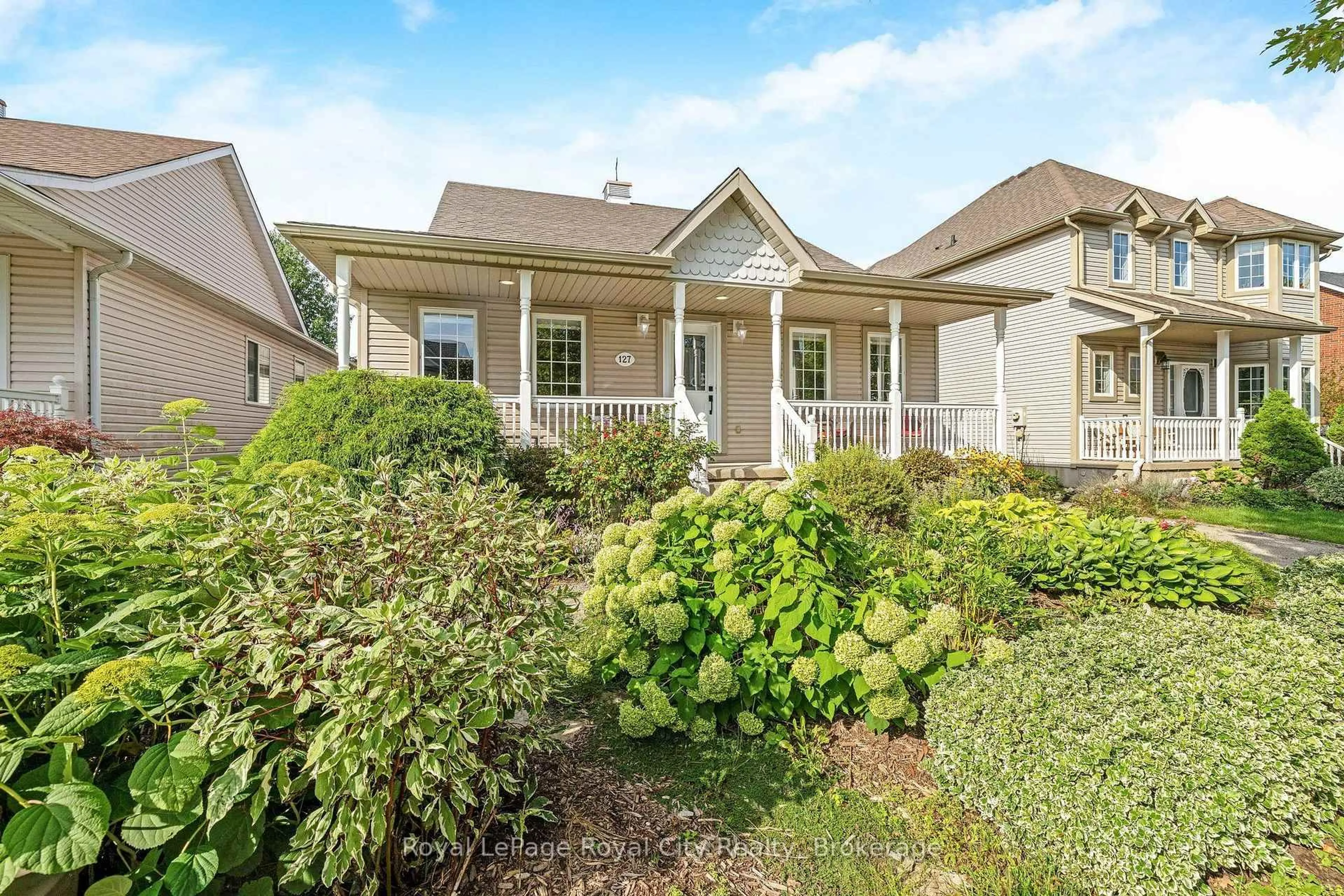 Home with vinyl exterior material, street for 127 Old Maple Blvd, Guelph/Eramosa Ontario N0B 2K0