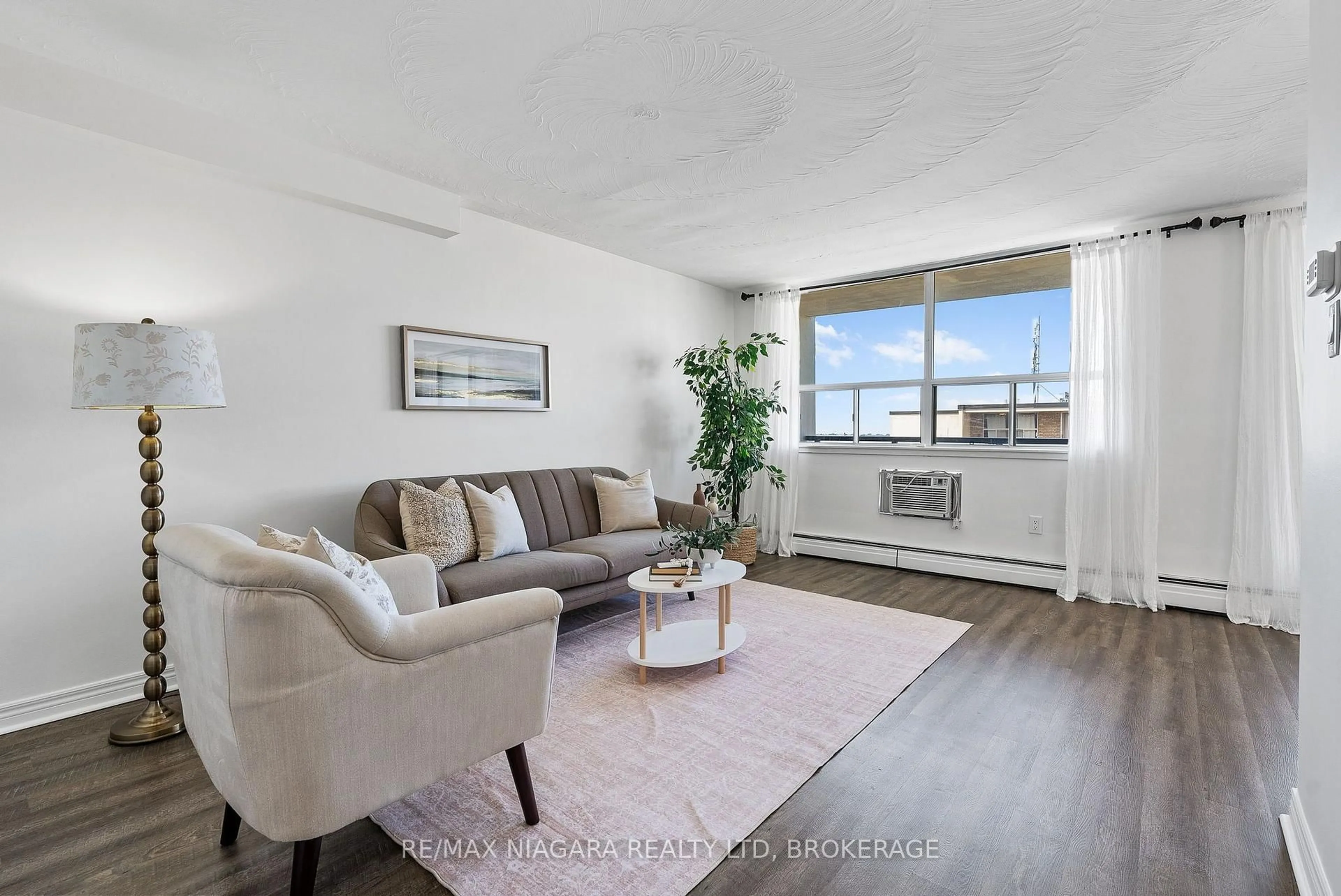 Living room with furniture, unknown for 359 Geneva St #1002, St. Catharines Ontario L2N 2G5
