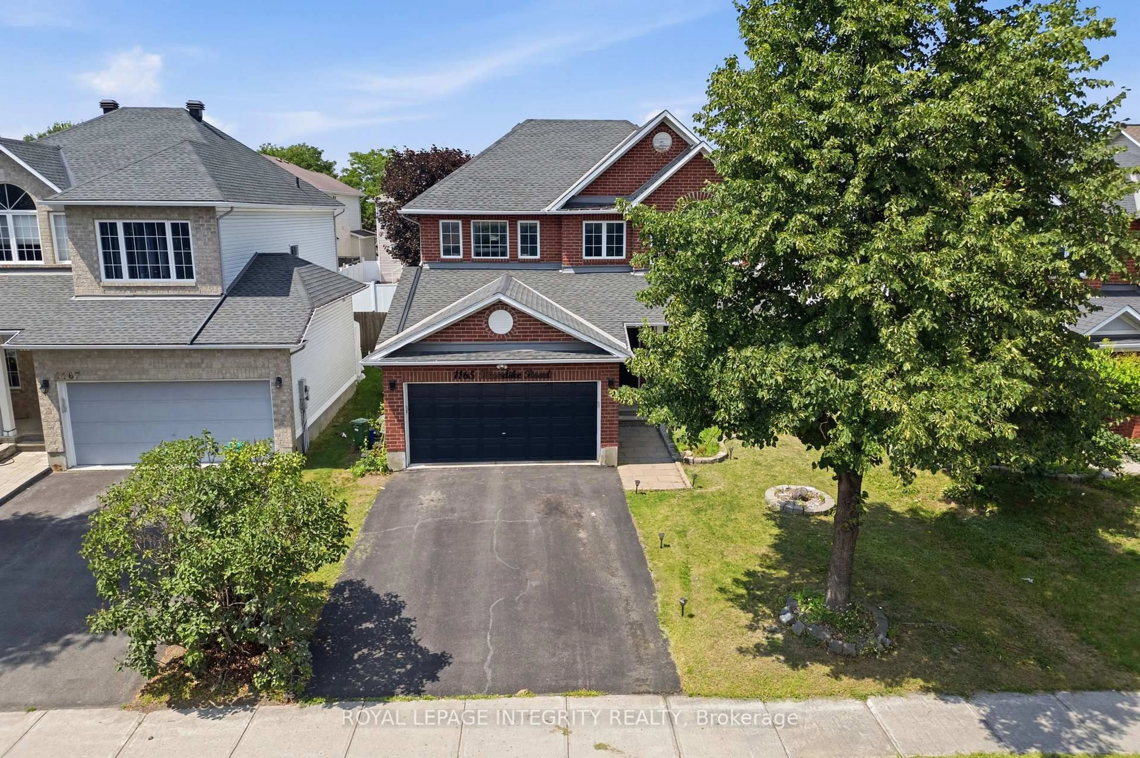 A pic from outside/outdoor area/front of a property/back of a property/a pic from drone, street for 1165 Klondike Rd, Ottawa Ontario K2W 1C8
