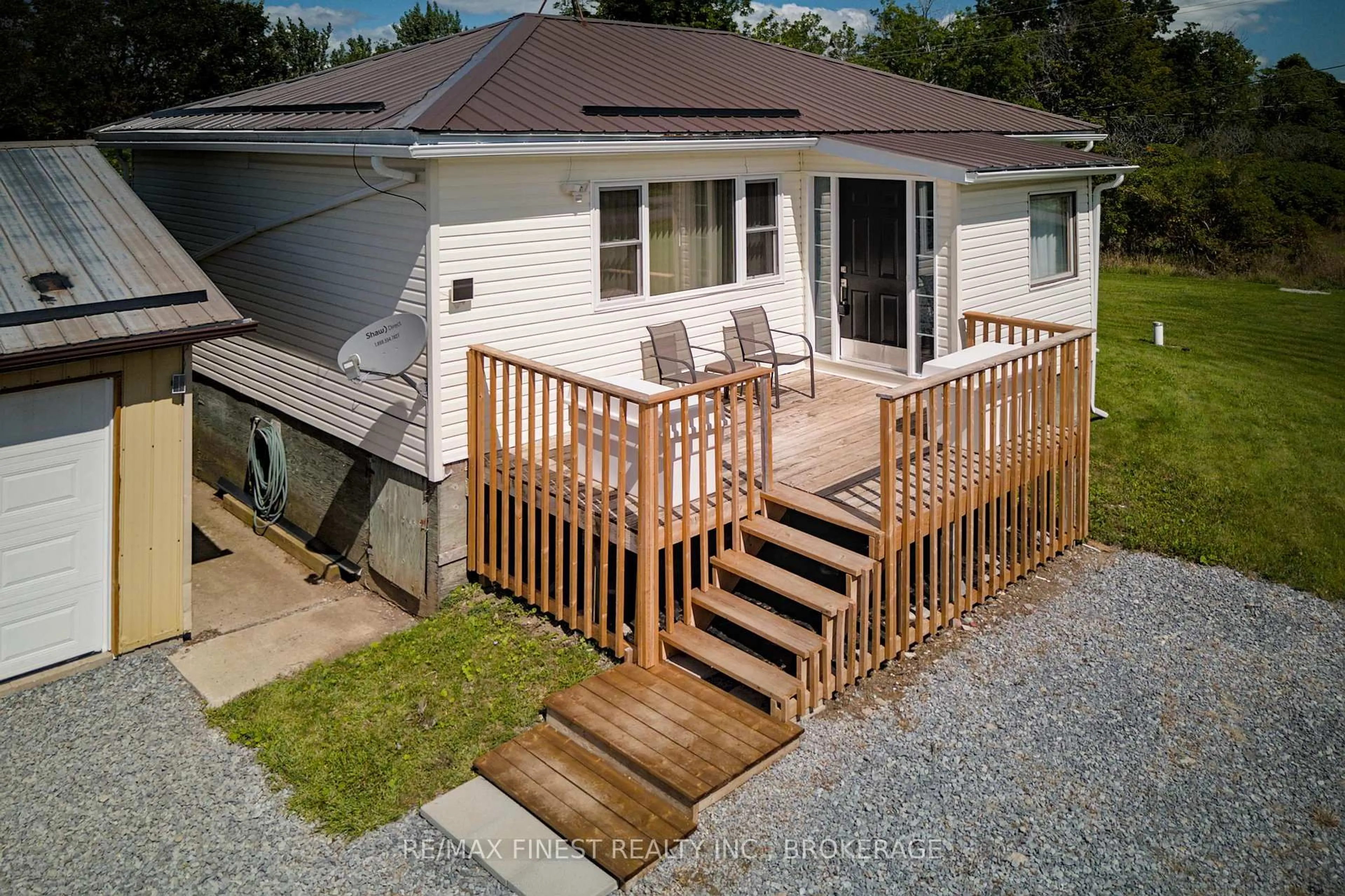 A pic from outside/outdoor area/front of a property/back of a property/a pic from drone, street for 7720 Front Rd, Stella Ontario K0H 2S0