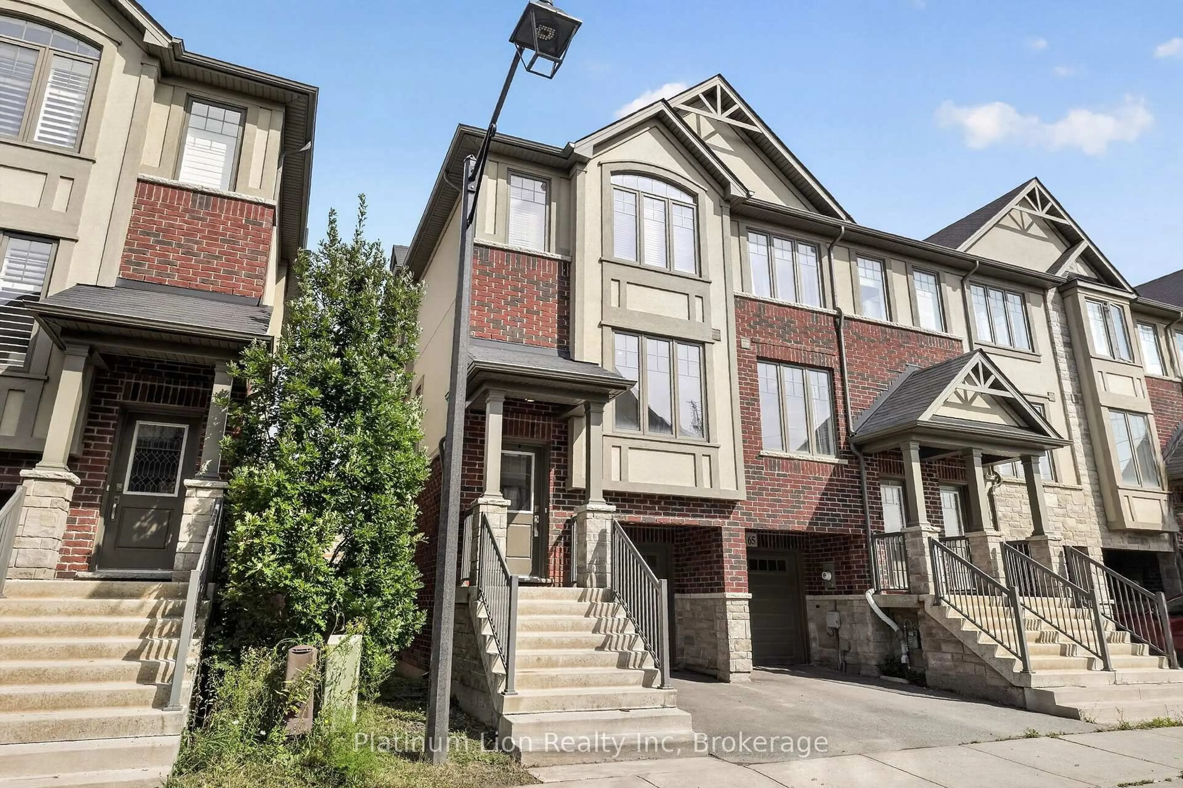 Home with brick exterior material, street for 1169 Garner Rd #66, Hamilton Ontario L9G 0G8