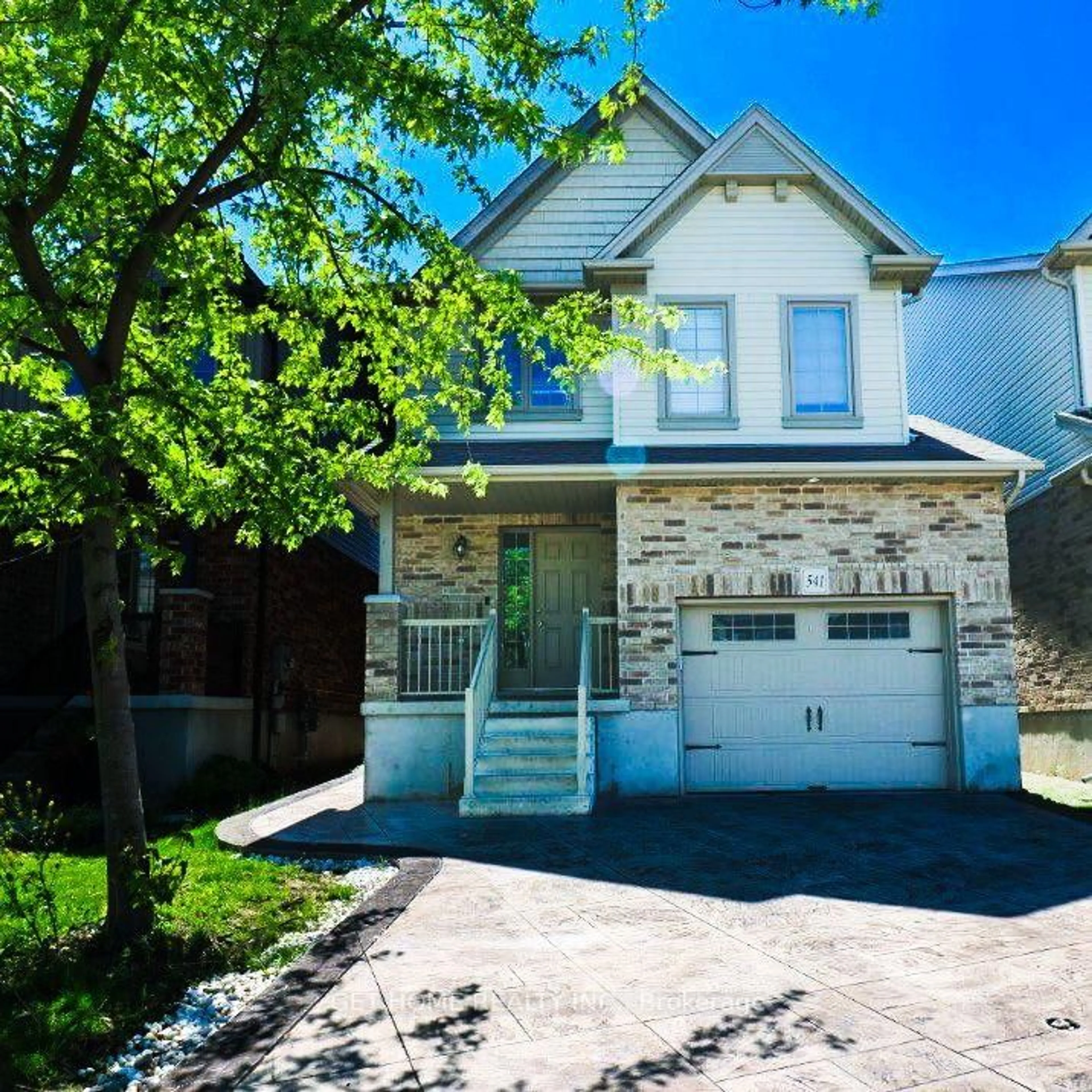 Home with brick exterior material, street for 541 Starwood Dr, Guelph Ontario N1E 0L8