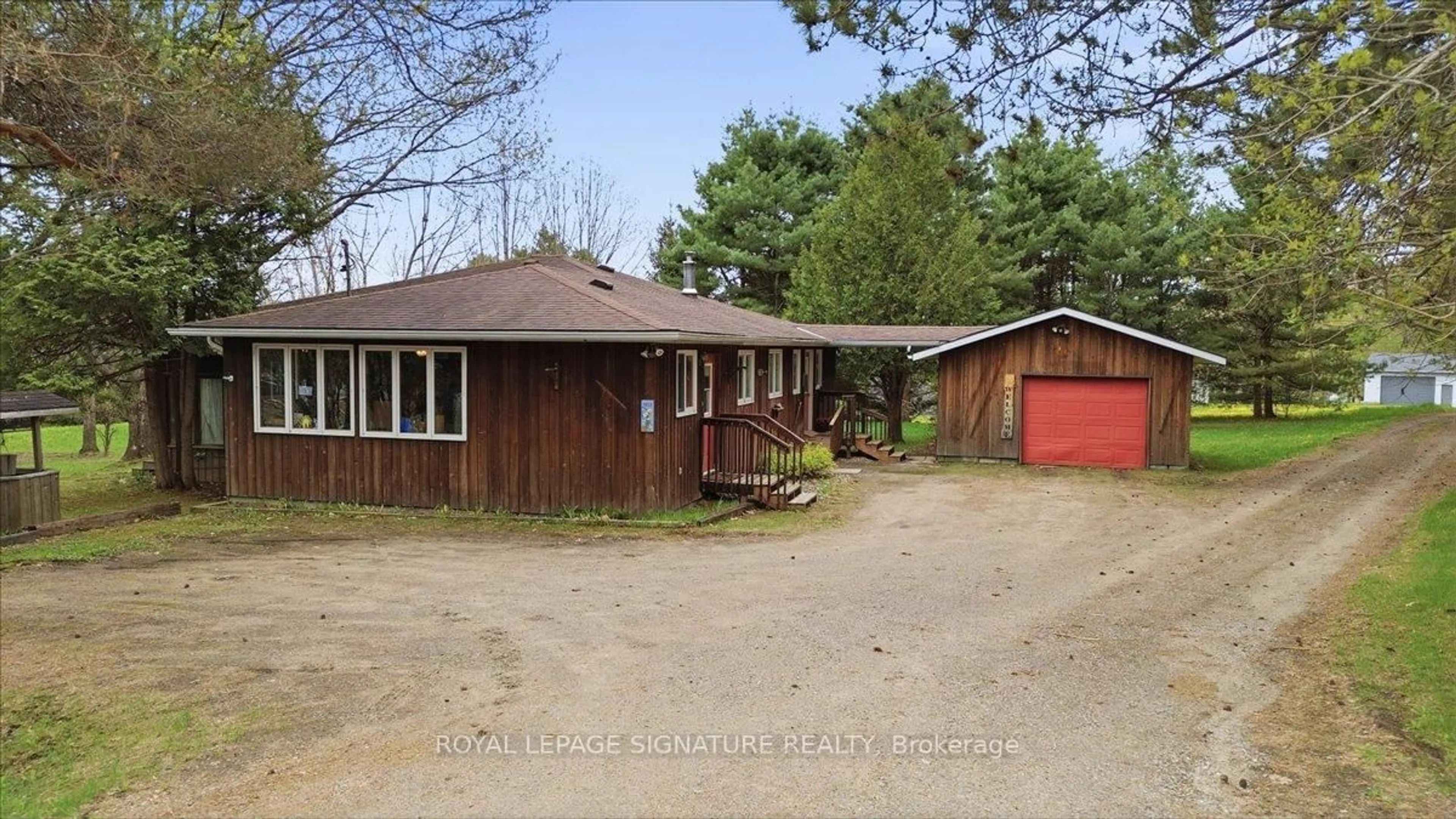A pic from outside/outdoor area/front of a property/back of a property/a pic from drone, unknown for 2212-1 Highway 60, Lake of Bays Ontario P1H 2J6