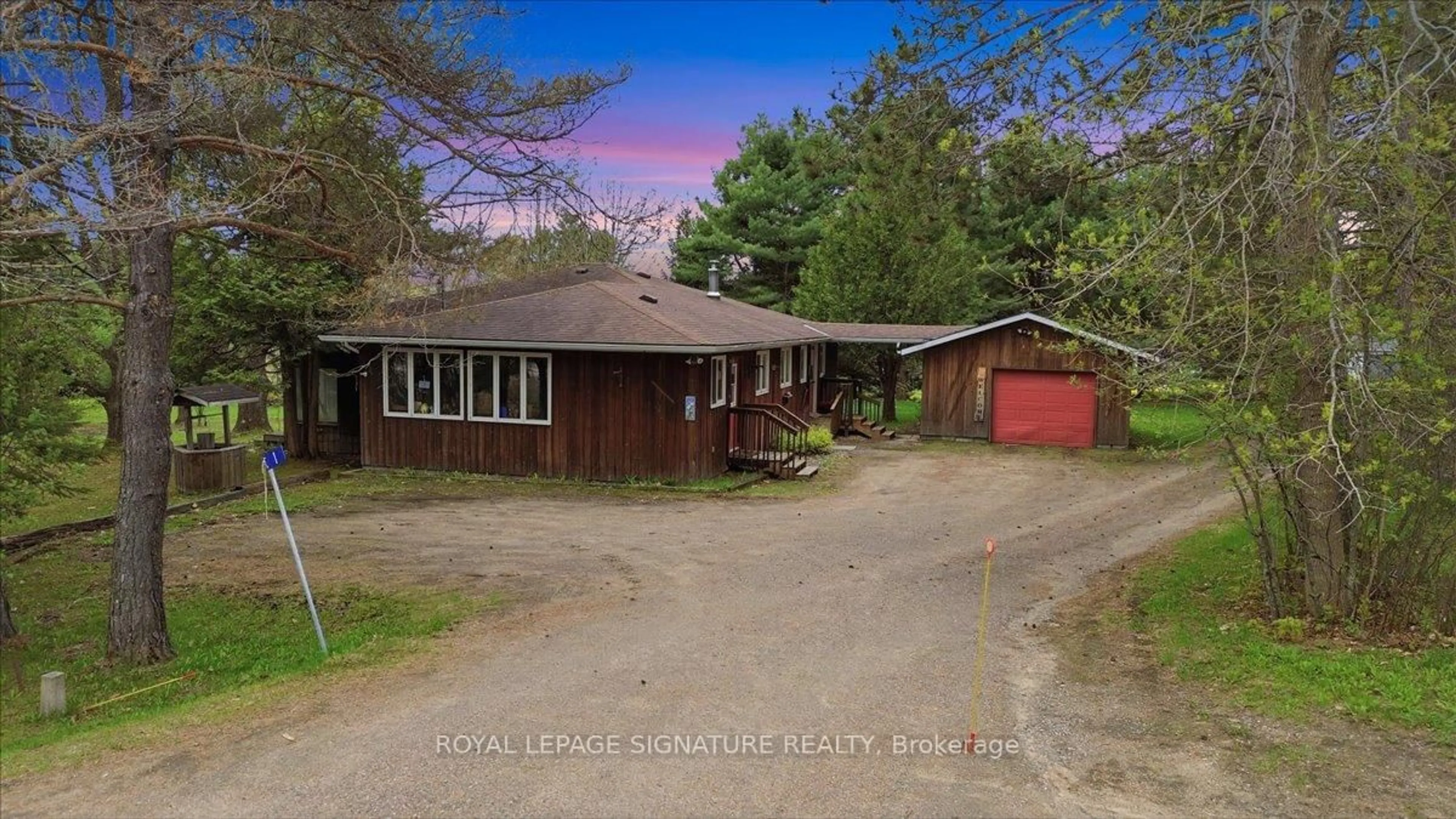 A pic from outside/outdoor area/front of a property/back of a property/a pic from drone, unknown for 2212-1 Highway 60, Lake of Bays Ontario P1H 2J6