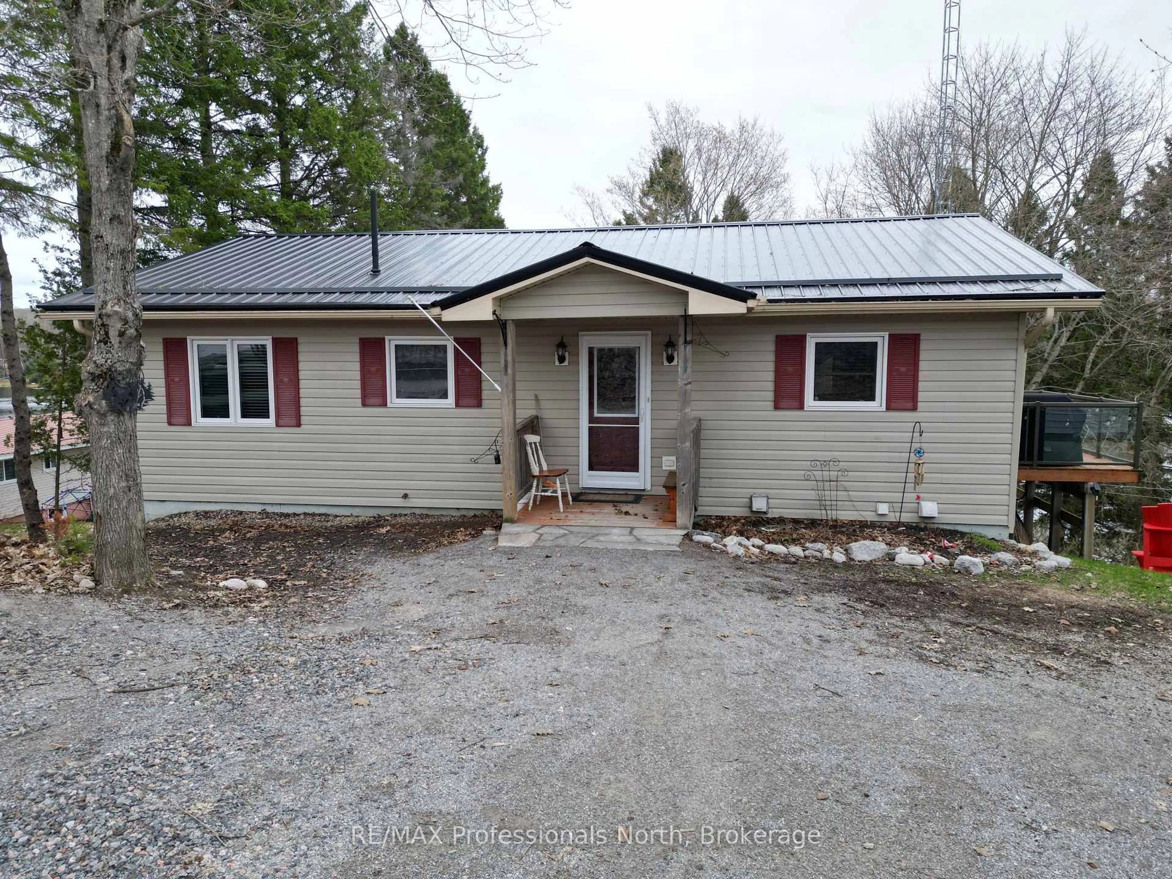 A pic from outside/outdoor area/front of a property/back of a property/a pic from drone, building for 1099 Summer Lane, Minden Hills Ontario K0M 2K0