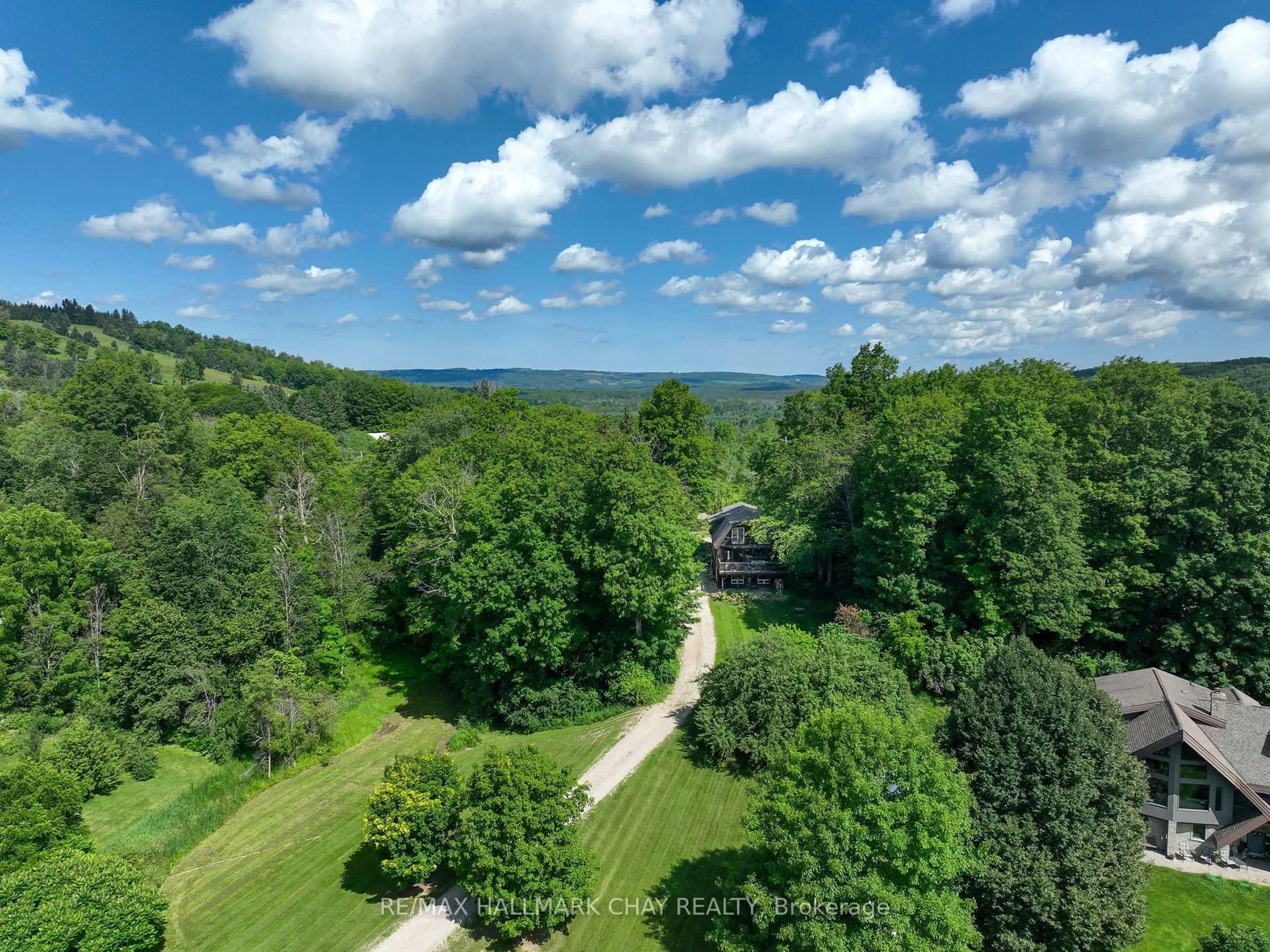 A pic from outside/outdoor area/front of a property/back of a property/a pic from drone, forest/trees view for 42 MOUNTAINVIEW Rd, Mulmur Ontario L0N 1M0