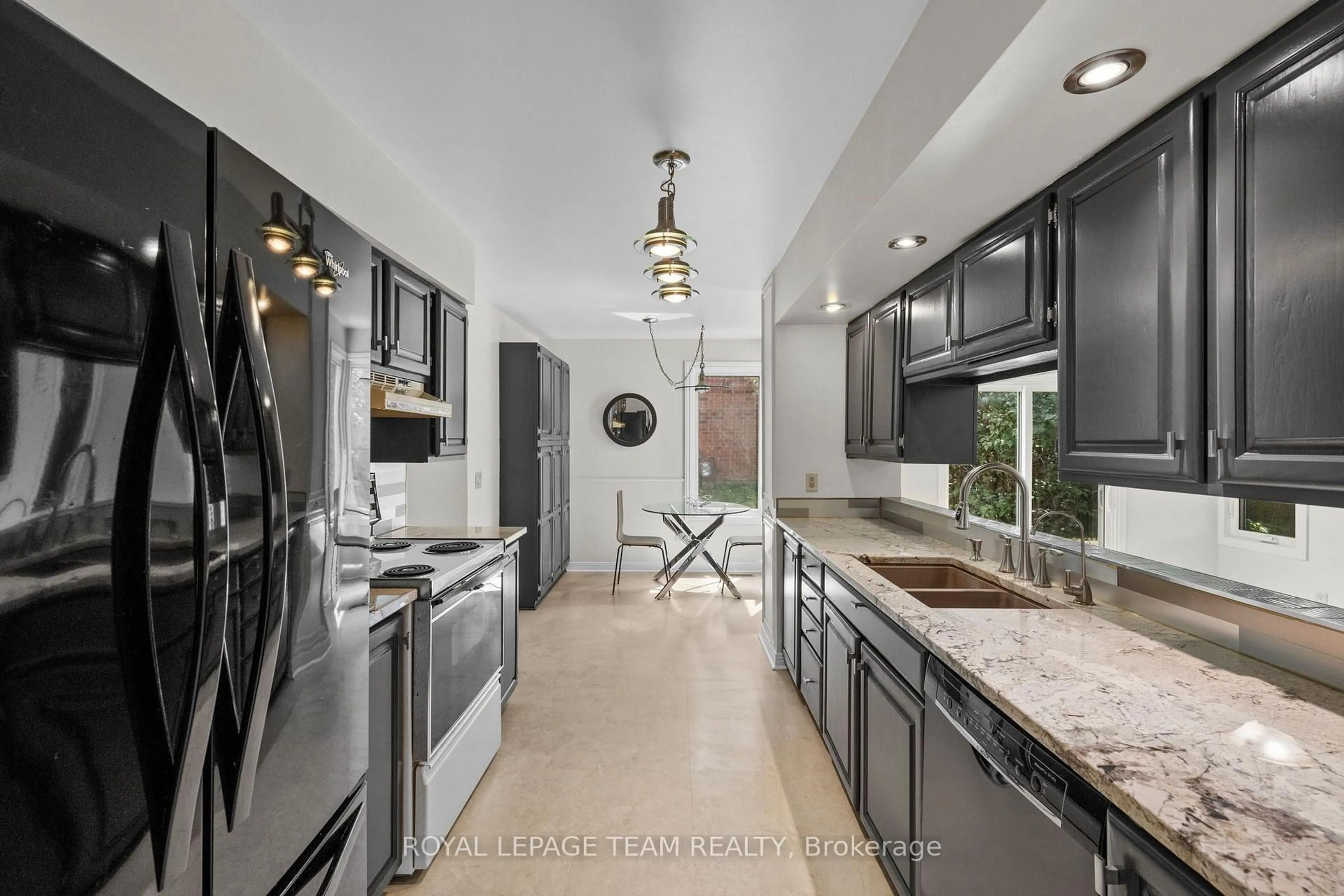 Open concept kitchen, ceramic/tile floor for 59 Naismith Cres, Ottawa Ontario K2L 2K7