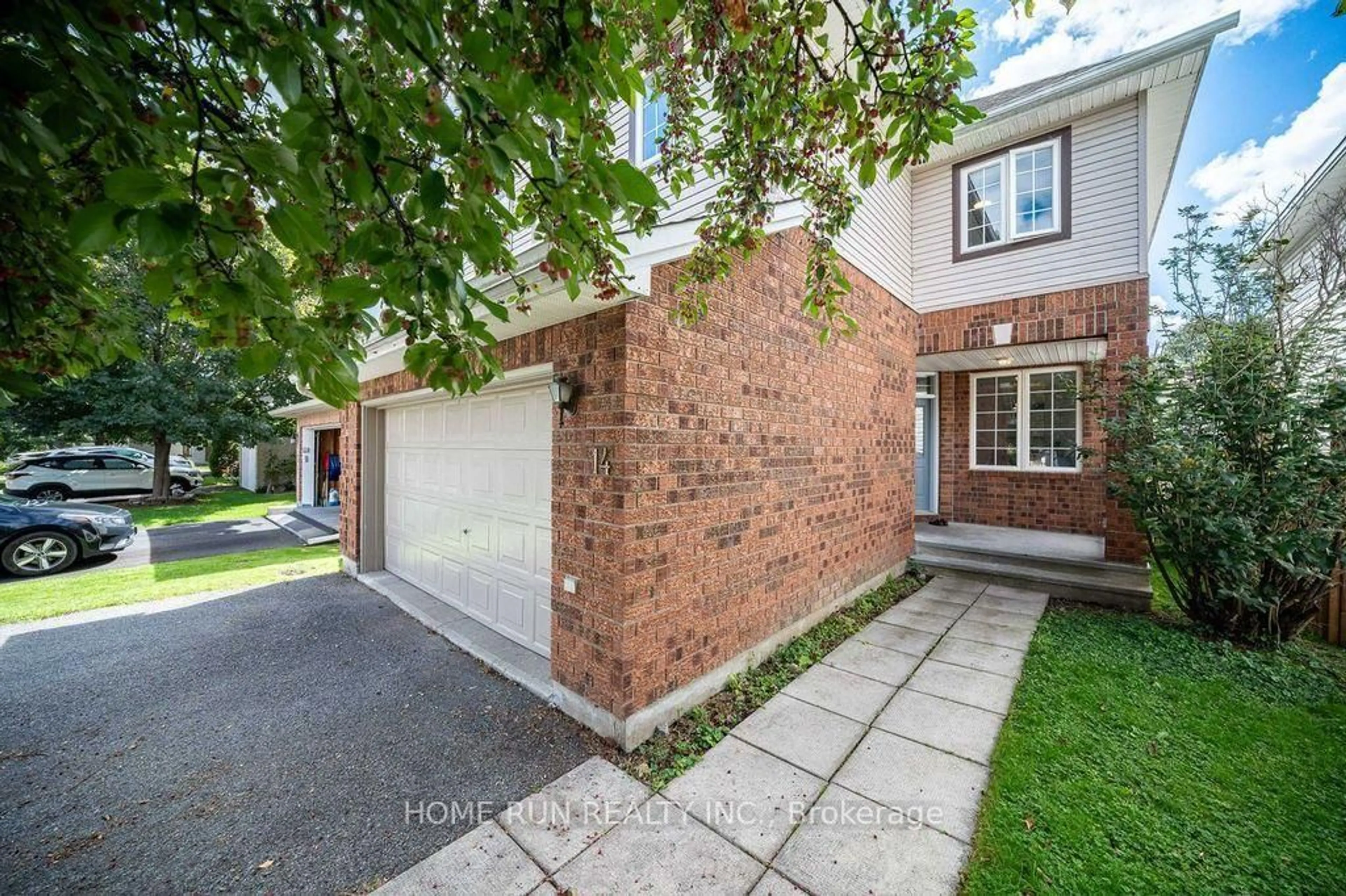 Home with brick exterior material, street for 14 Spur Ave, Ottawa Ontario K2M 2B5