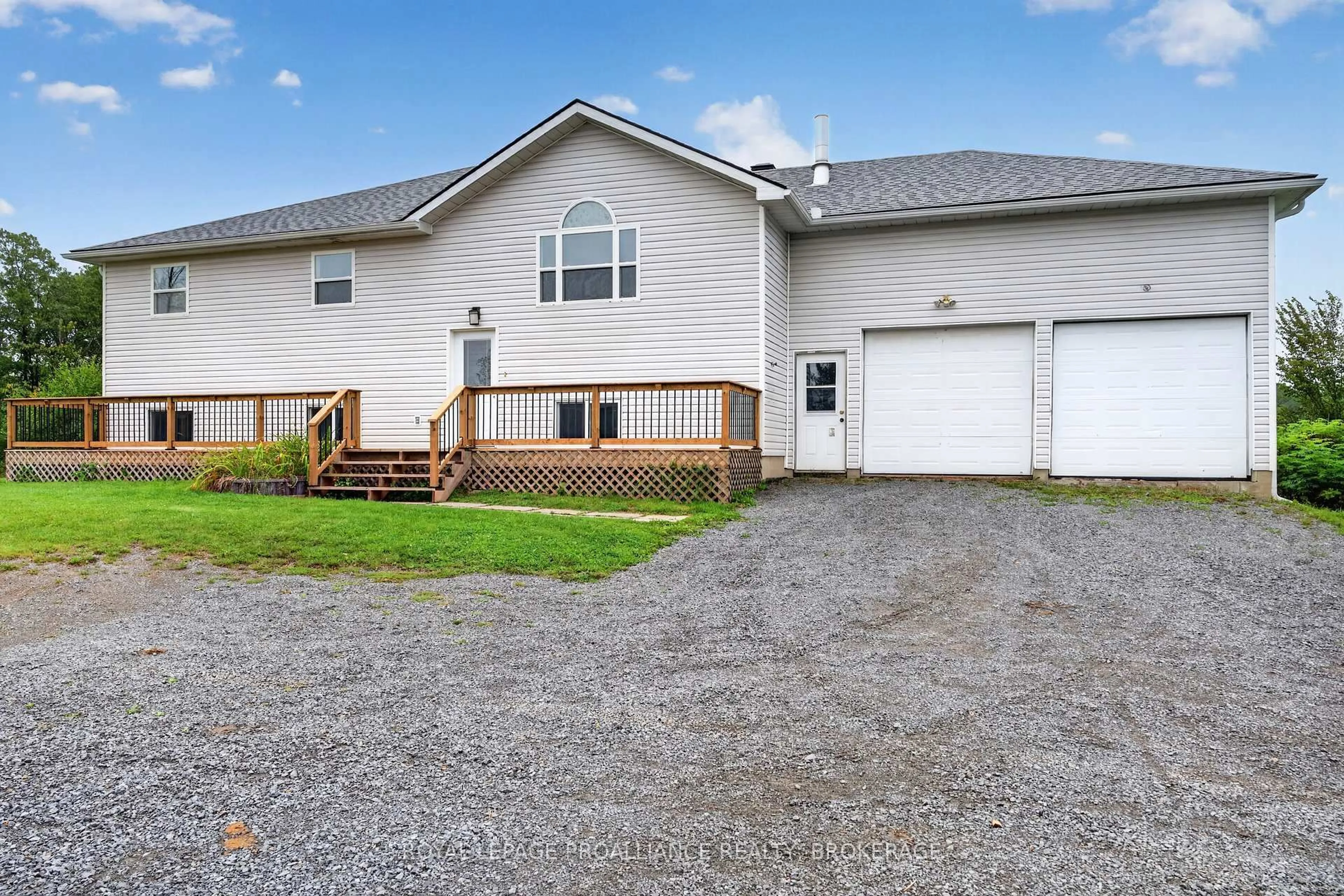 Home with vinyl exterior material, street for 1023 Browns Rd, Godfrey Ontario K0H 1T0