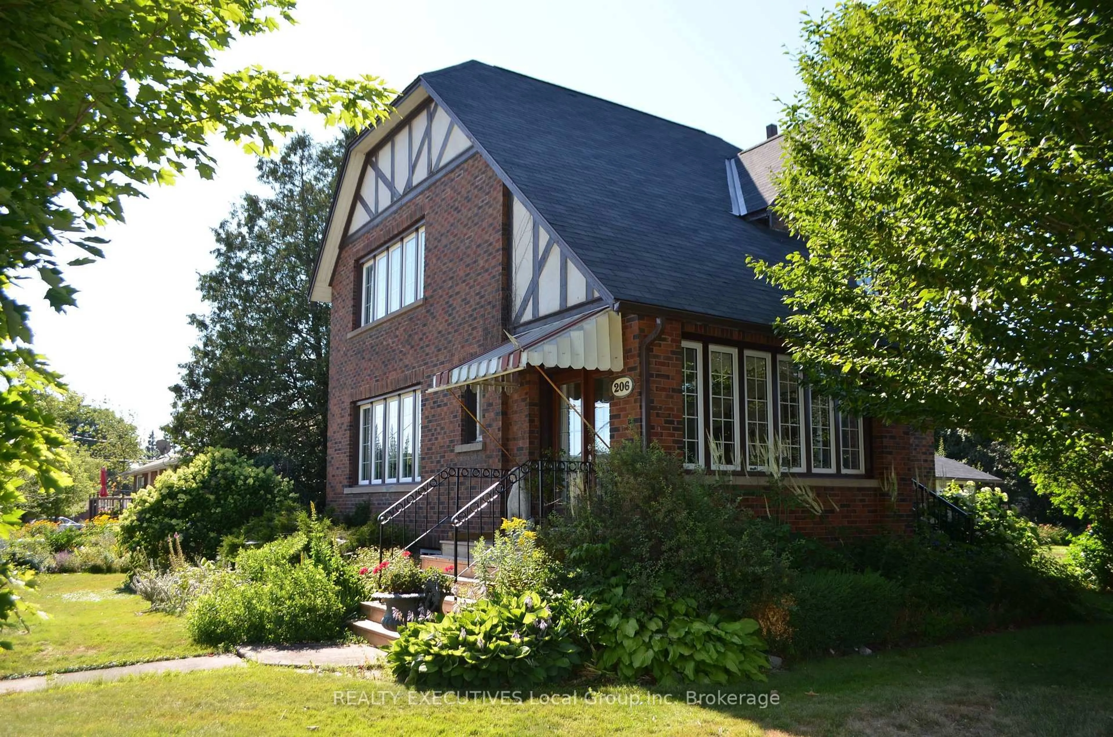 Home with brick exterior material, street for 206 Clark St, Powassan Ontario P0H 1Z0