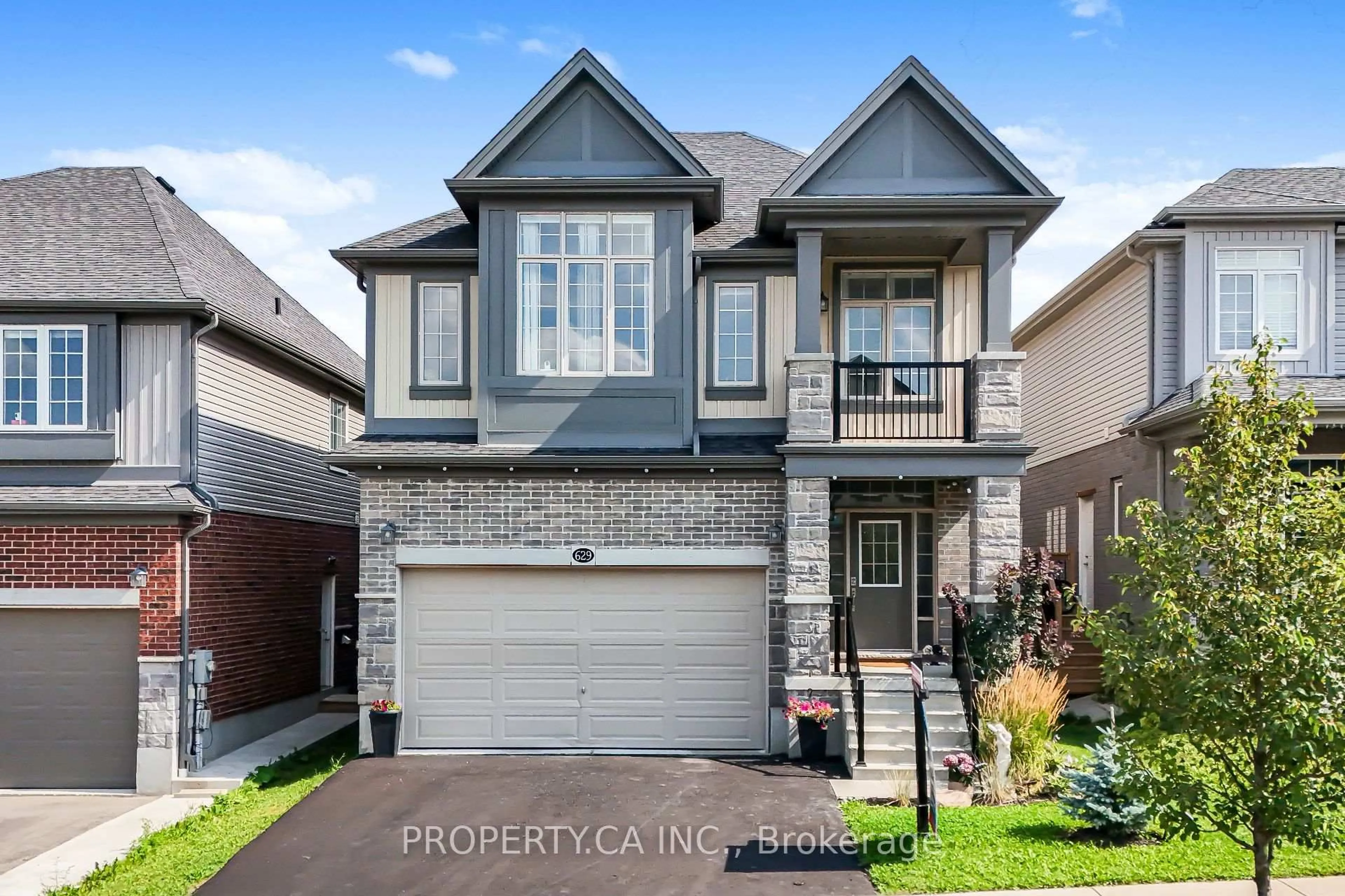 Home with brick exterior material, street for 629 Wild Rye St, Waterloo Ontario N2V 0E3