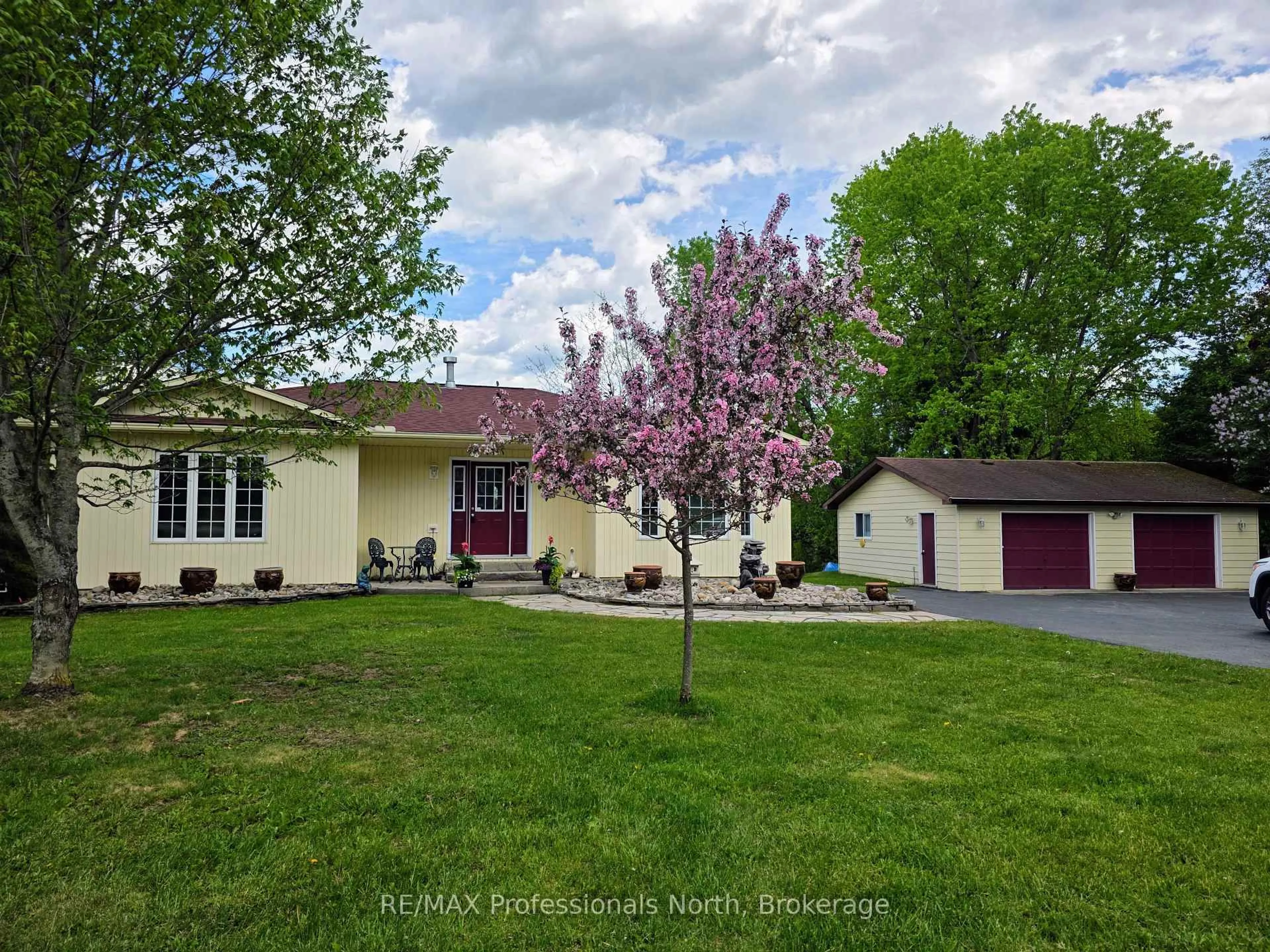 A pic from outside/outdoor area/front of a property/back of a property/a pic from drone, street for 4696 County Road 21, Dysart et al Ontario K0M 1S0