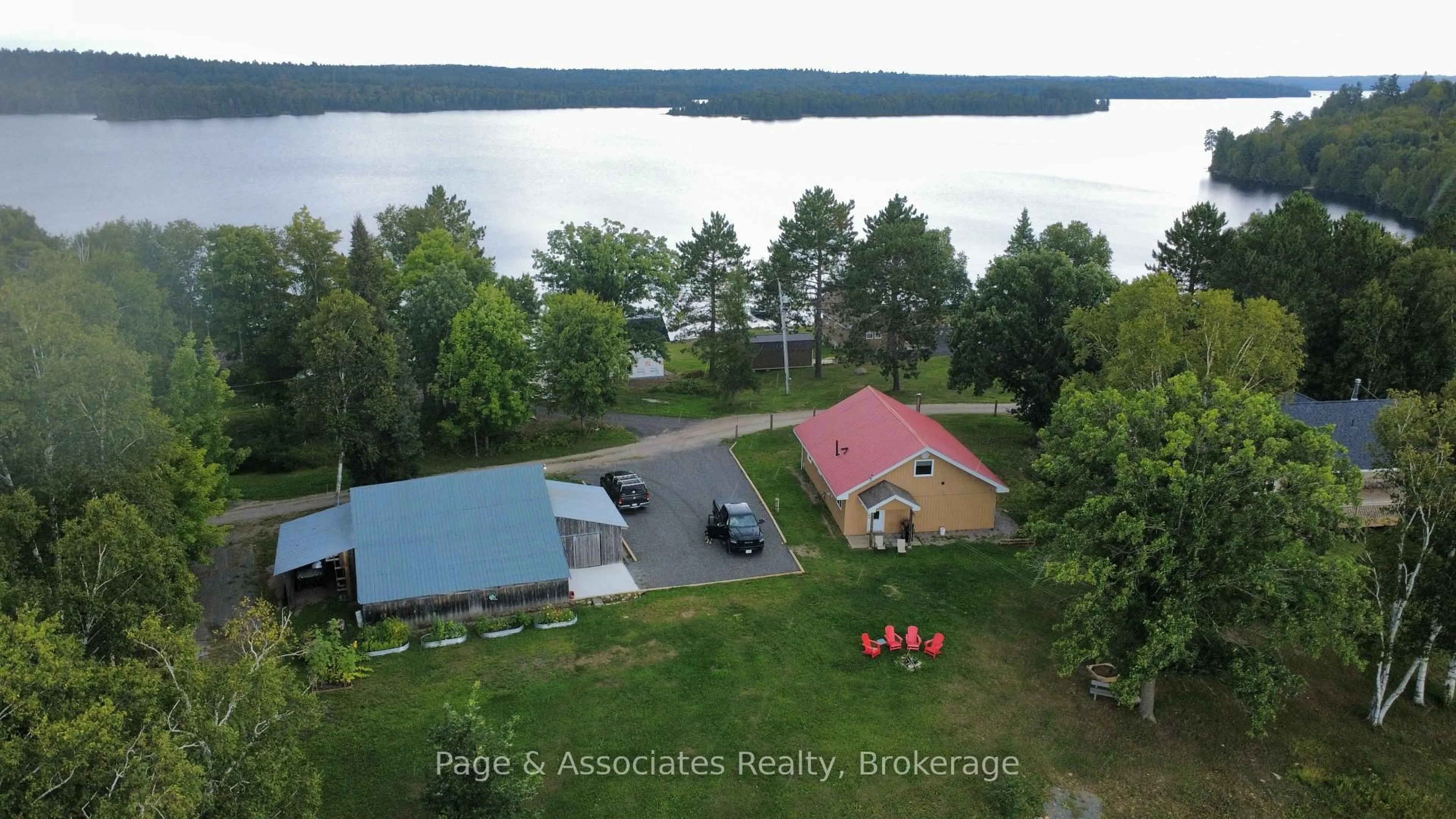 A pic from outside/outdoor area/front of a property/back of a property/a pic from drone, water/lake/river/ocean view for 206 Moose Point Rd, West Nipissing Ontario P0H 1L0