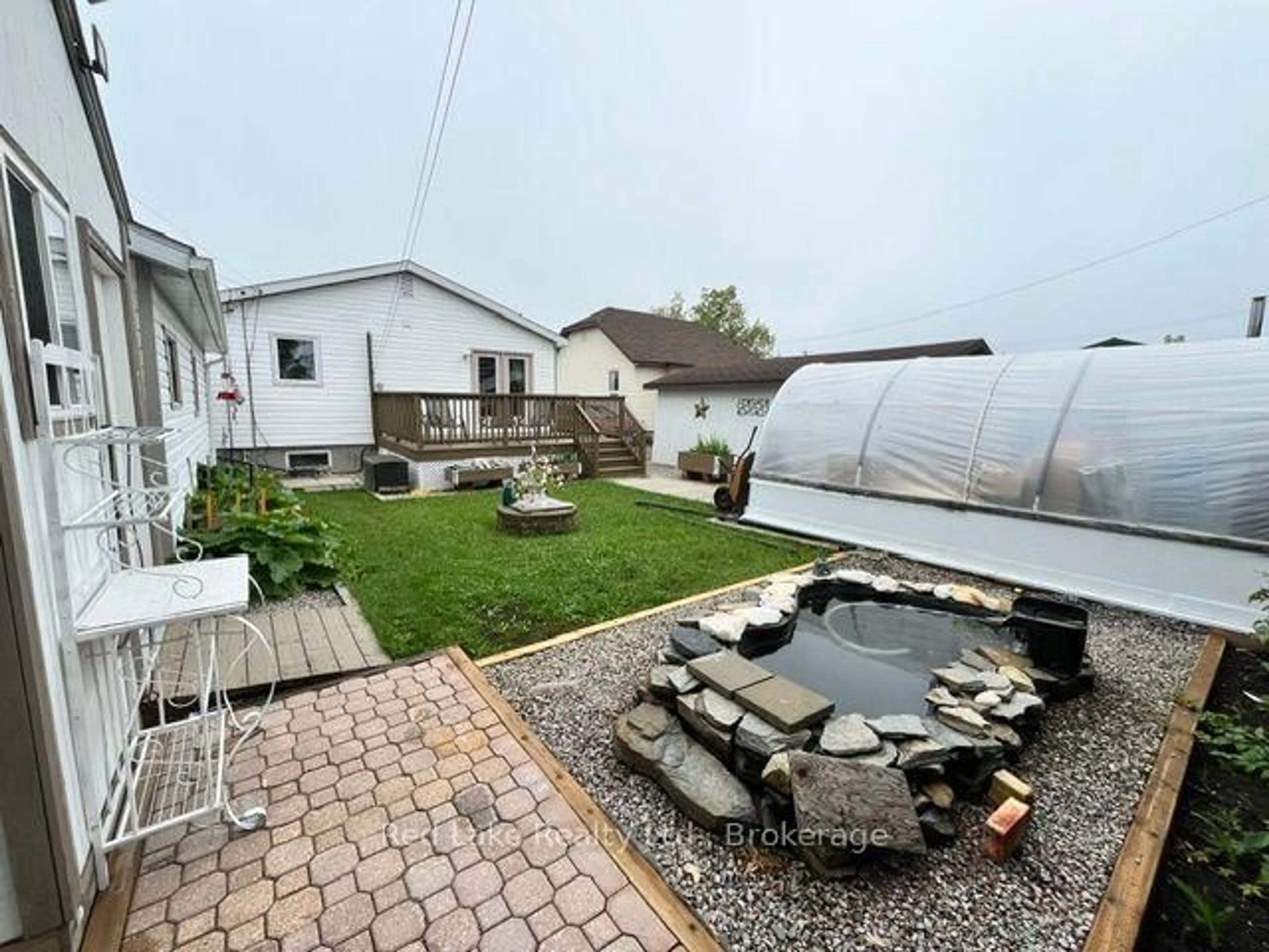 A pic from outside/outdoor area/front of a property/back of a property/a pic from drone, water/lake/river/ocean view for 7 Forth St, Red Lake Ontario P0V 1C0