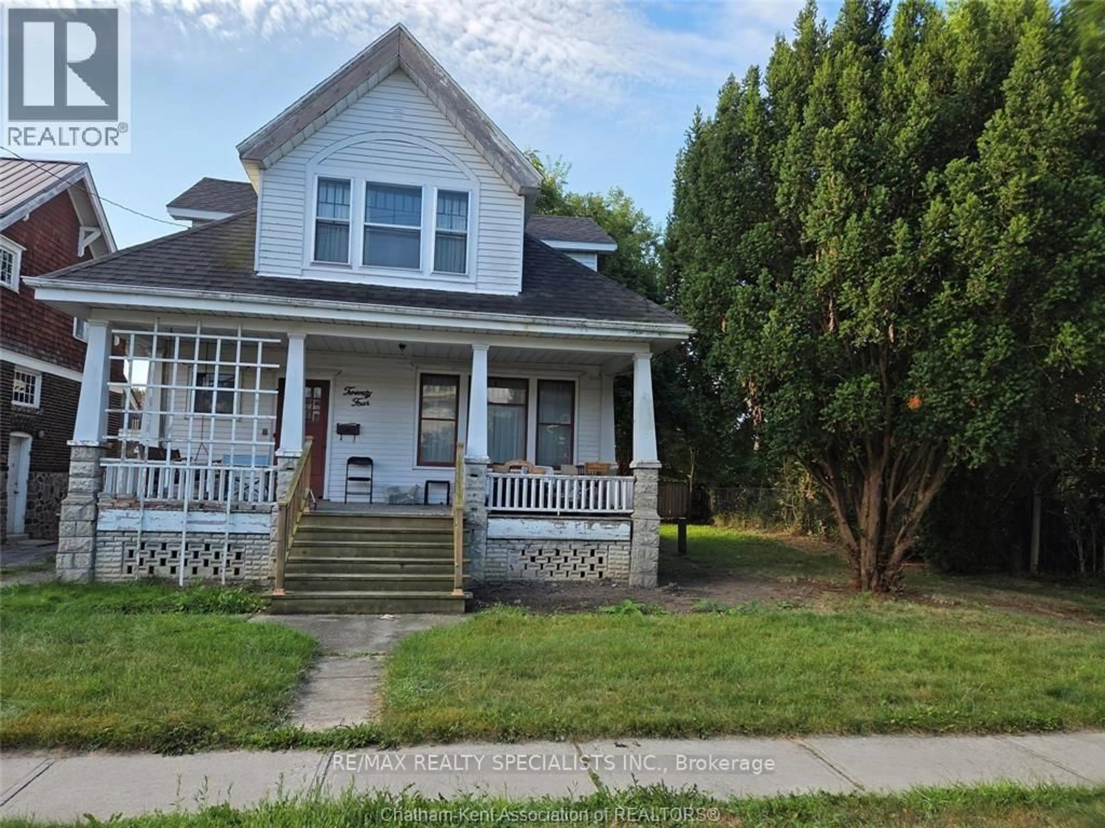 Home with vinyl exterior material, street for 24 Stanley Ave, Chatham-Kent Ontario N7M 3J2