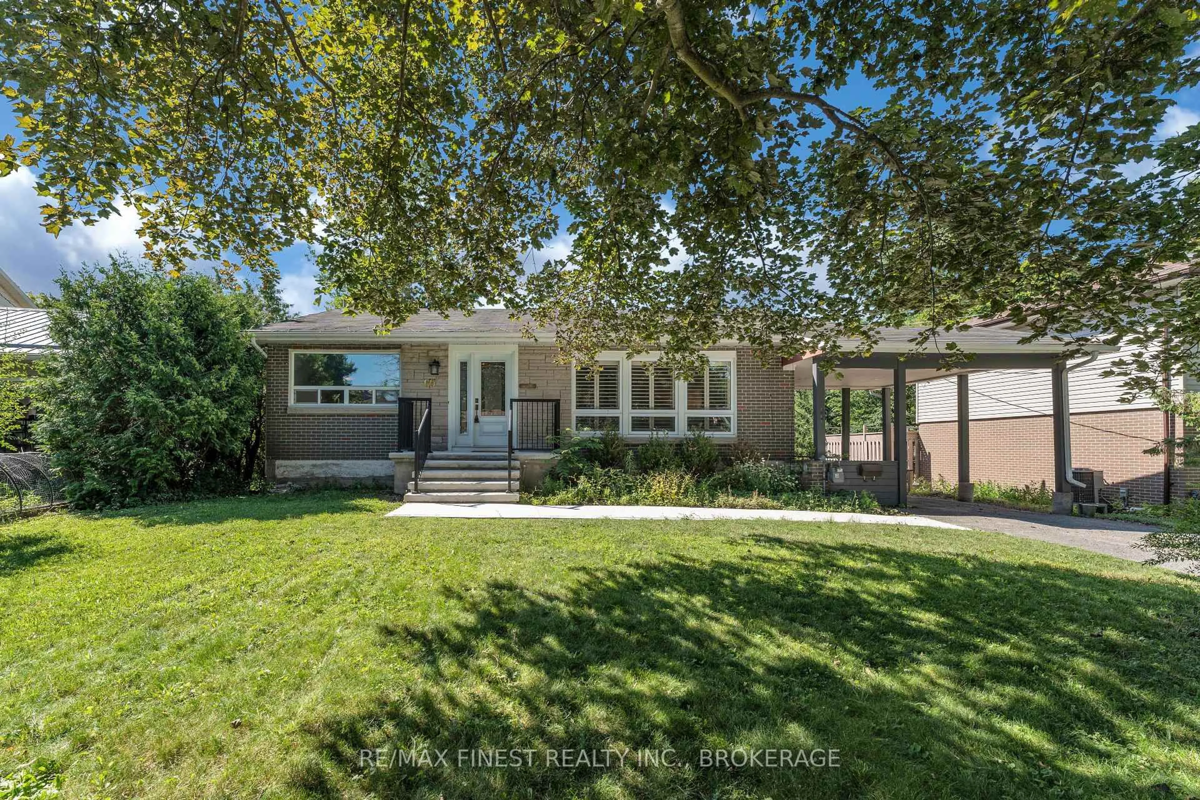 Home with vinyl exterior material, street for 60 Sherwood Dr, Kingston Ontario K7M 2E3