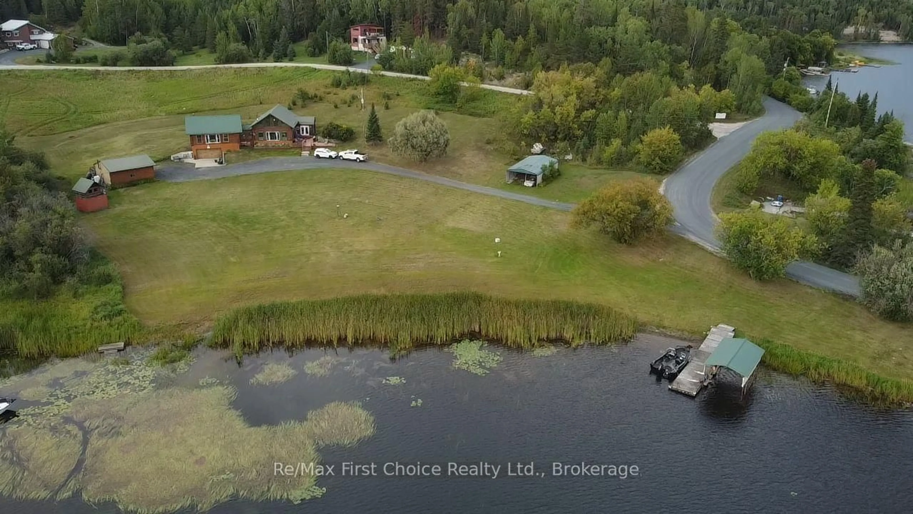 A pic from outside/outdoor area/front of a property/back of a property/a pic from drone, water/lake/river/ocean view for 812 Essex Rd, Kenora Ontario P9N 4P2