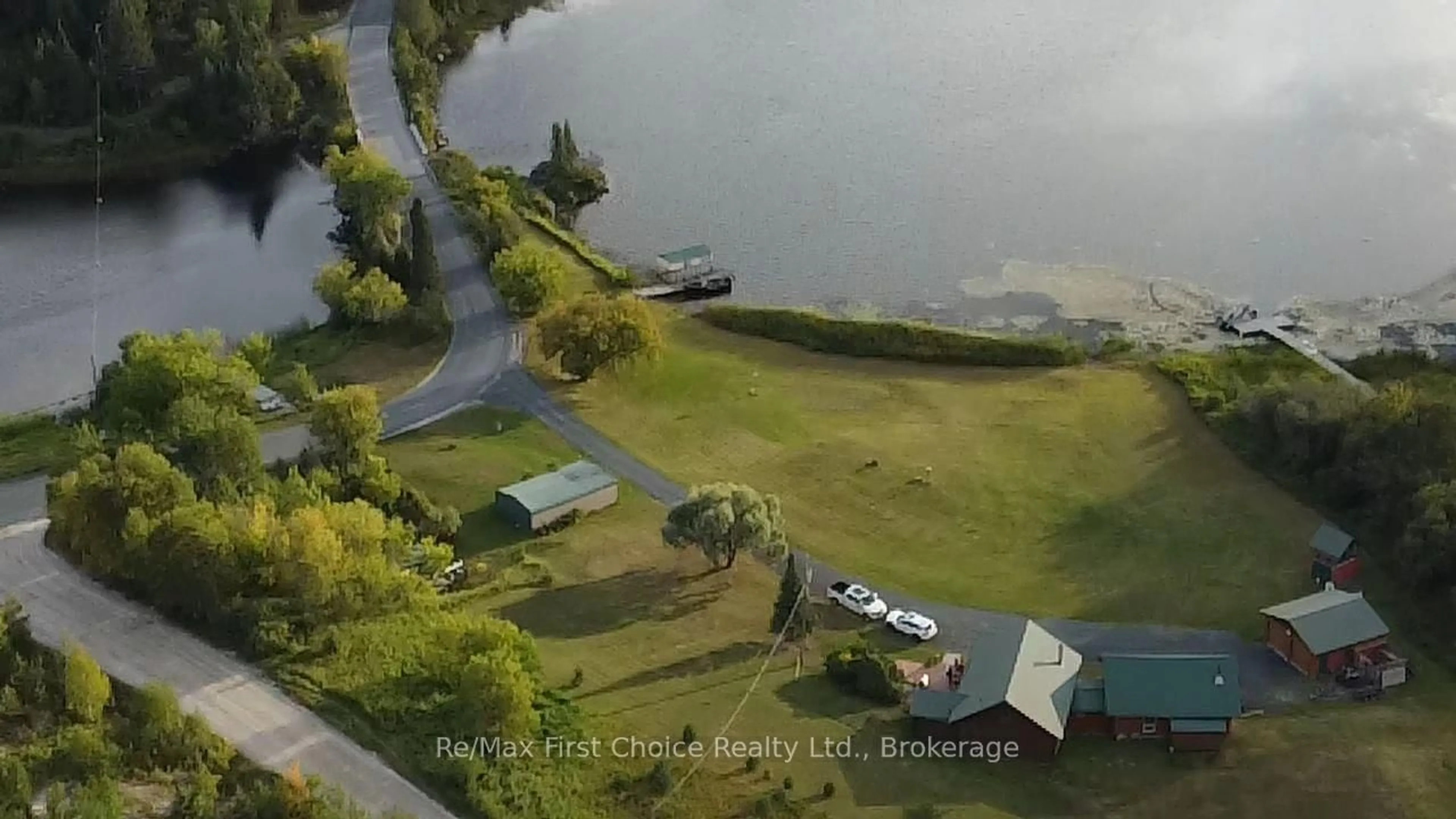 A pic from outside/outdoor area/front of a property/back of a property/a pic from drone, water/lake/river/ocean view for 812 Essex Rd, Kenora Ontario P9N 4P2