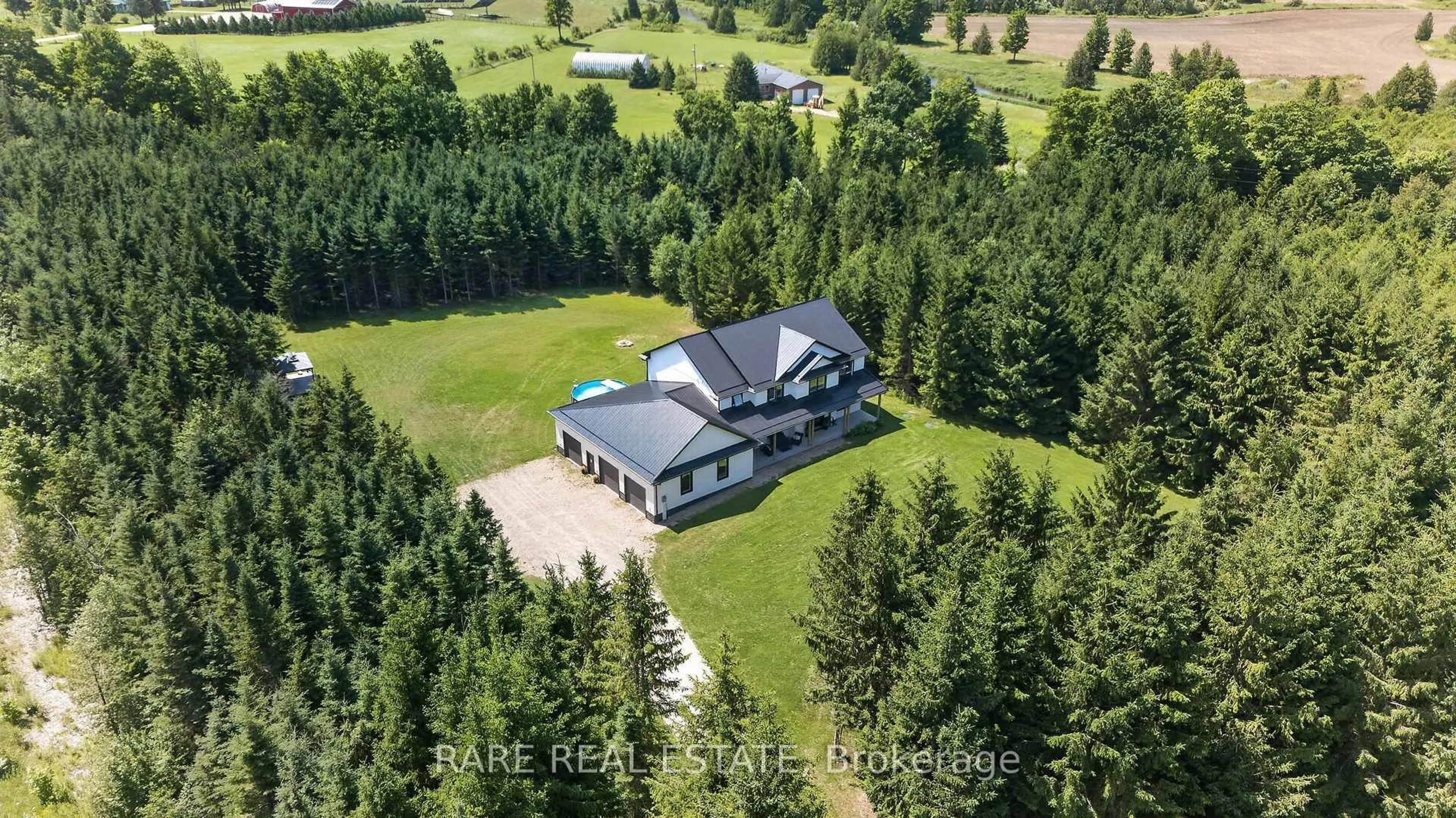 A pic from outside/outdoor area/front of a property/back of a property/a pic from drone, forest/trees view for 313026 Sideroad 35 Sdrd, Grey Highlands Ontario N0C 1E0