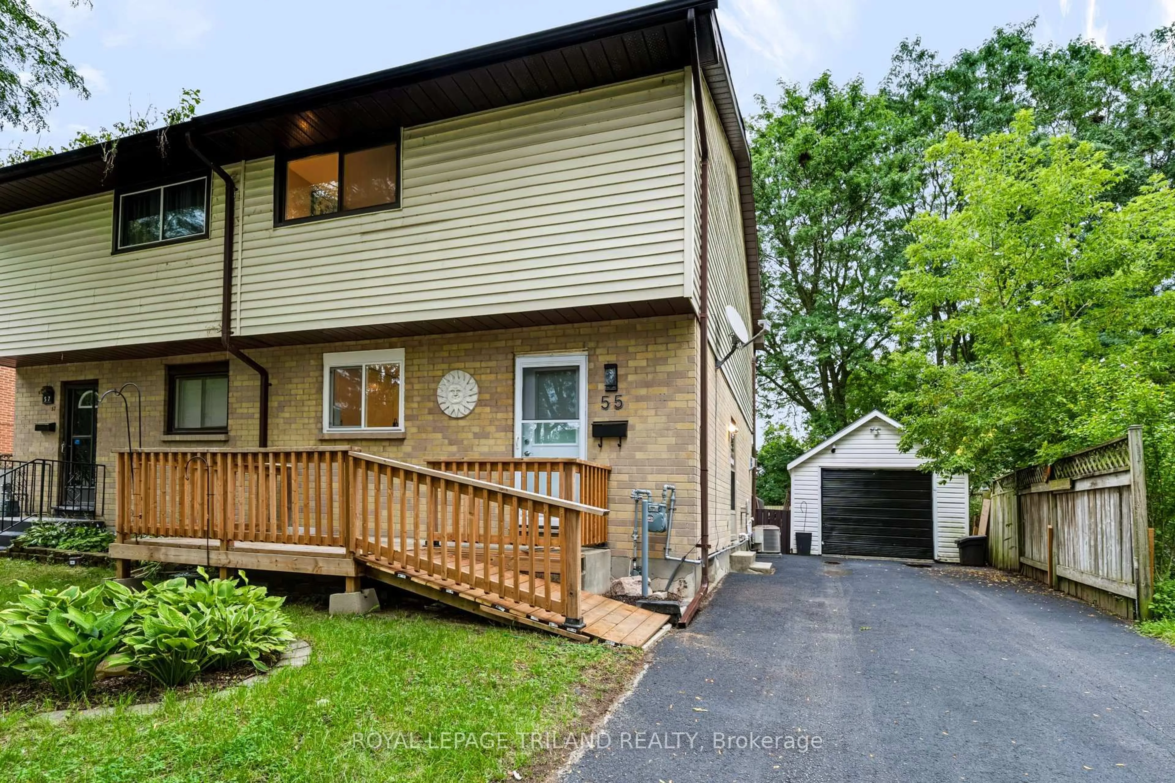 Home with vinyl exterior material, street for 55 Mohegan Cres, London East Ontario N5V 2X7