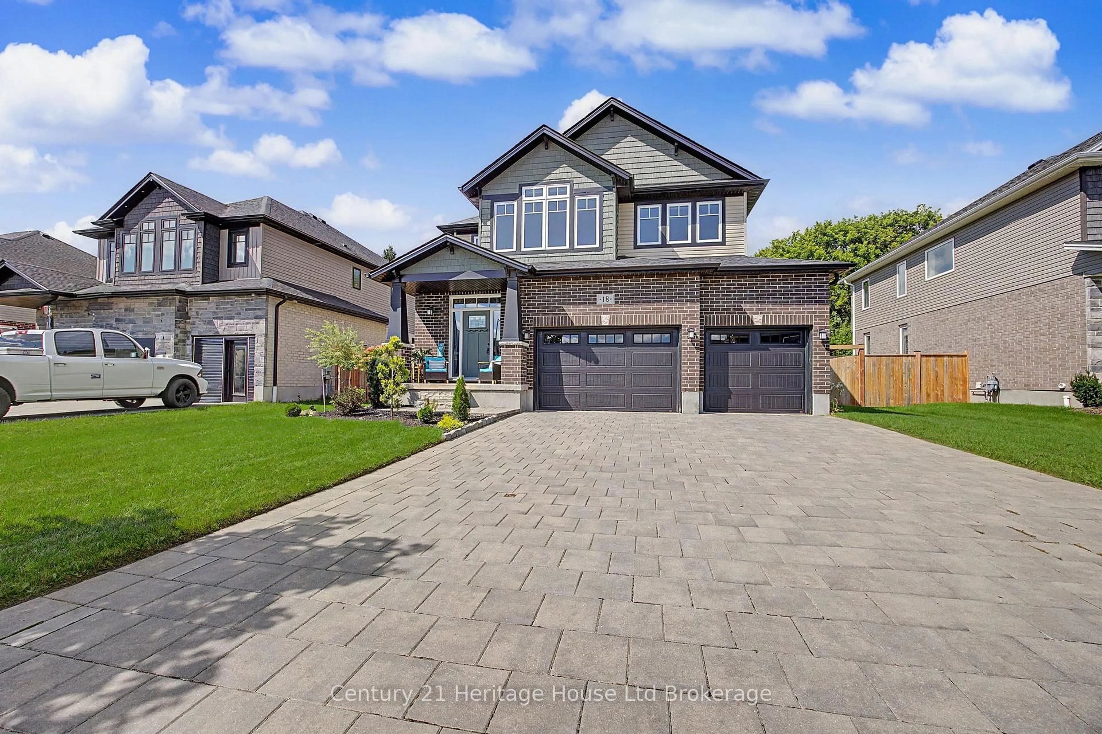 Home with brick exterior material, street for 18 Darlison Dr, Zorra Ontario N0M 2M0