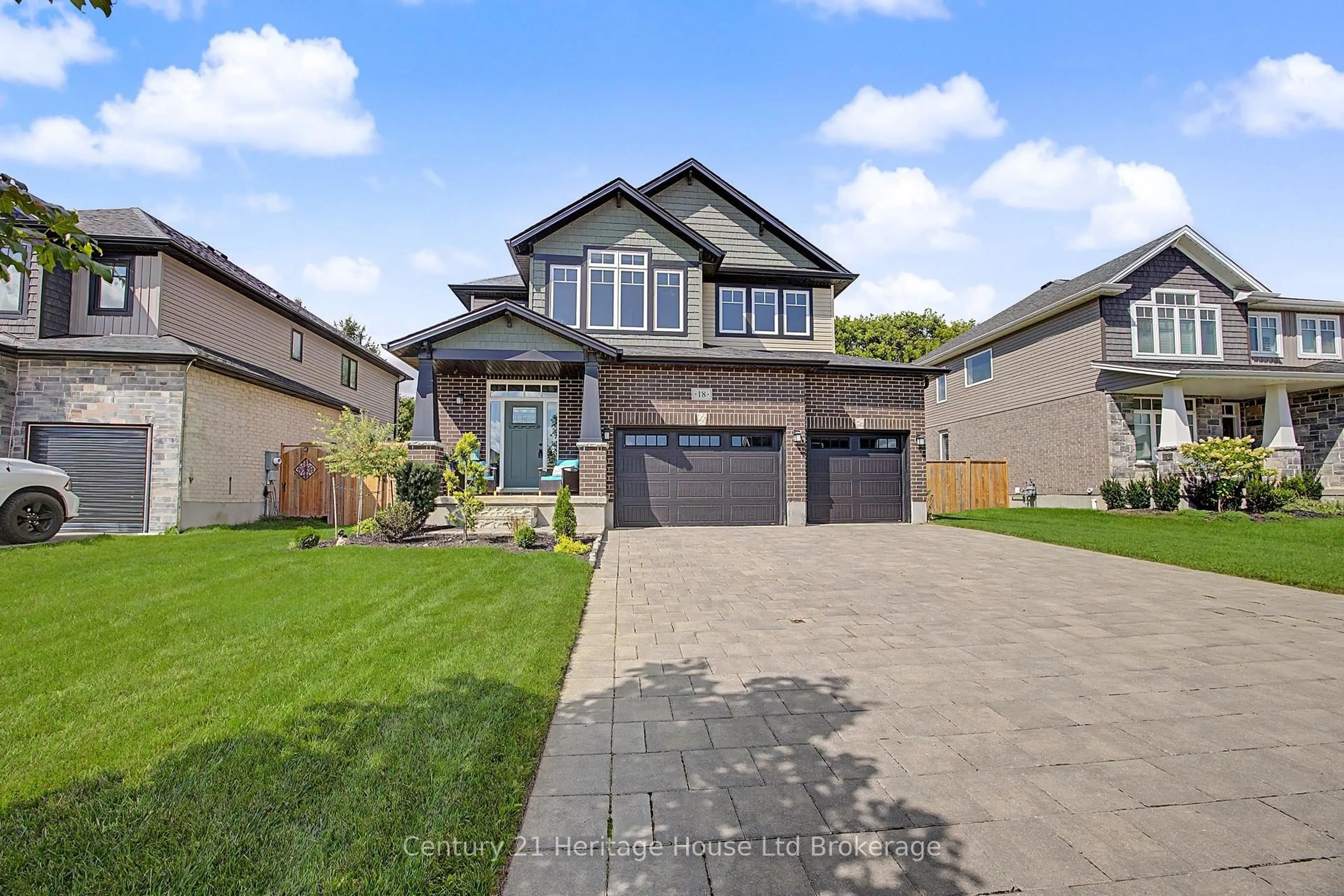 Home with brick exterior material, street for 18 Darlison Dr, Zorra Ontario N0M 2M0
