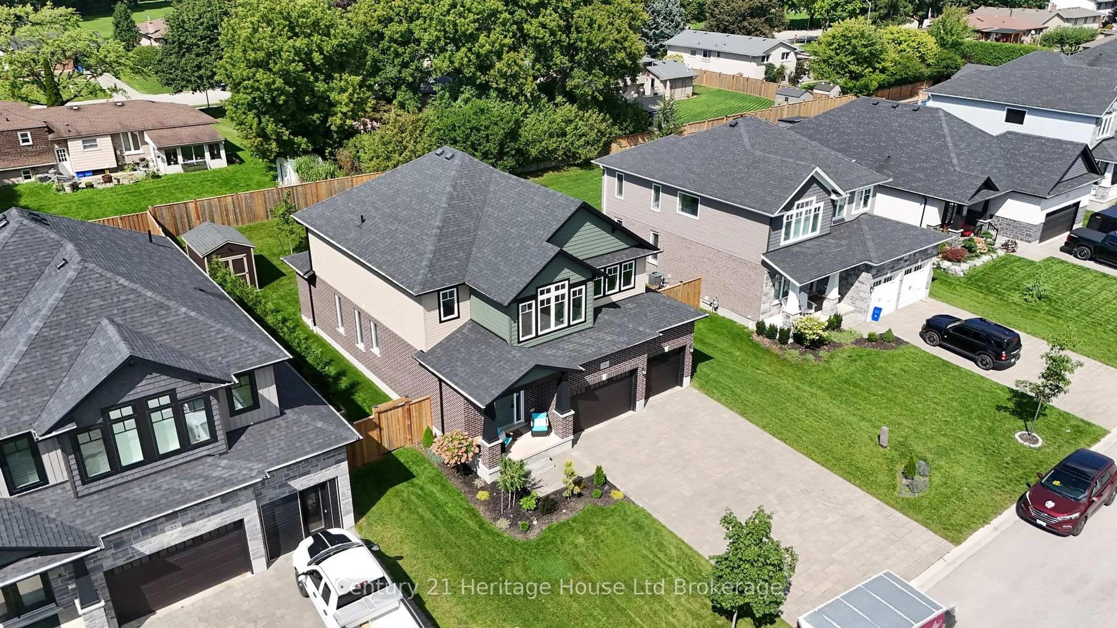 A pic from outside/outdoor area/front of a property/back of a property/a pic from drone, street for 18 Darlison Dr, Zorra Ontario N0M 2M0