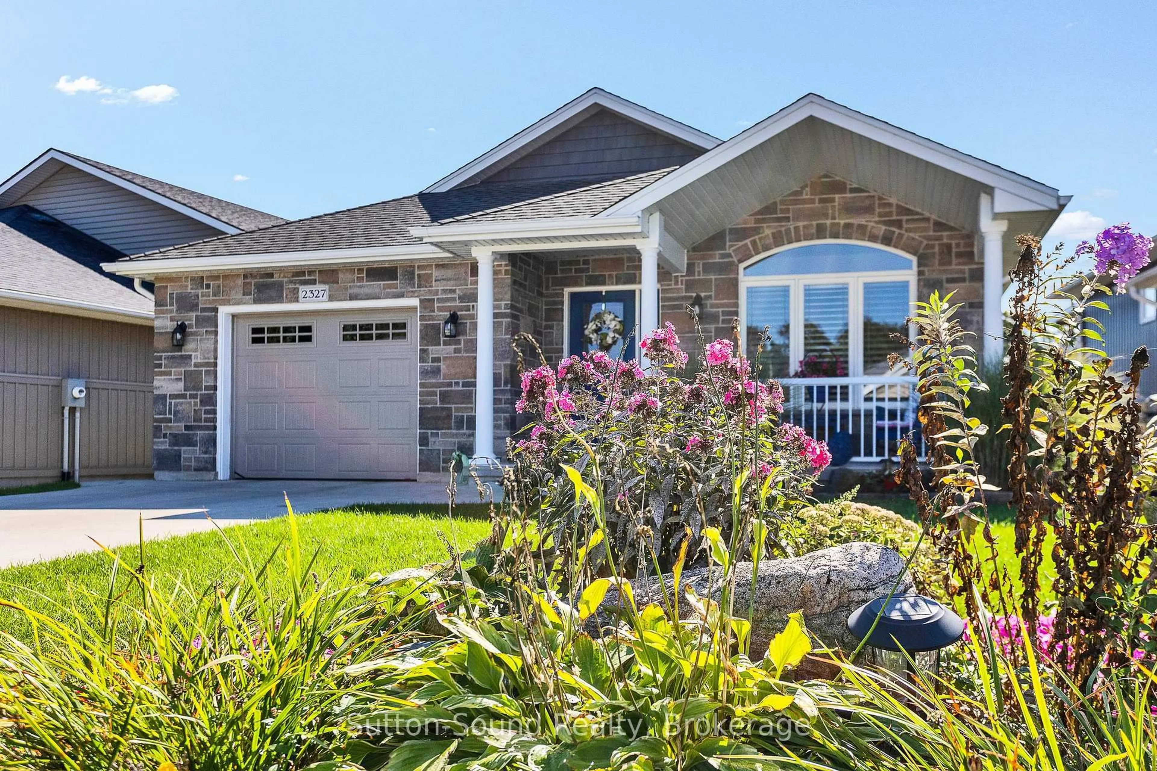 Home with brick exterior material, street for 2327 10th Ave, Owen Sound Ontario N4K 0B2