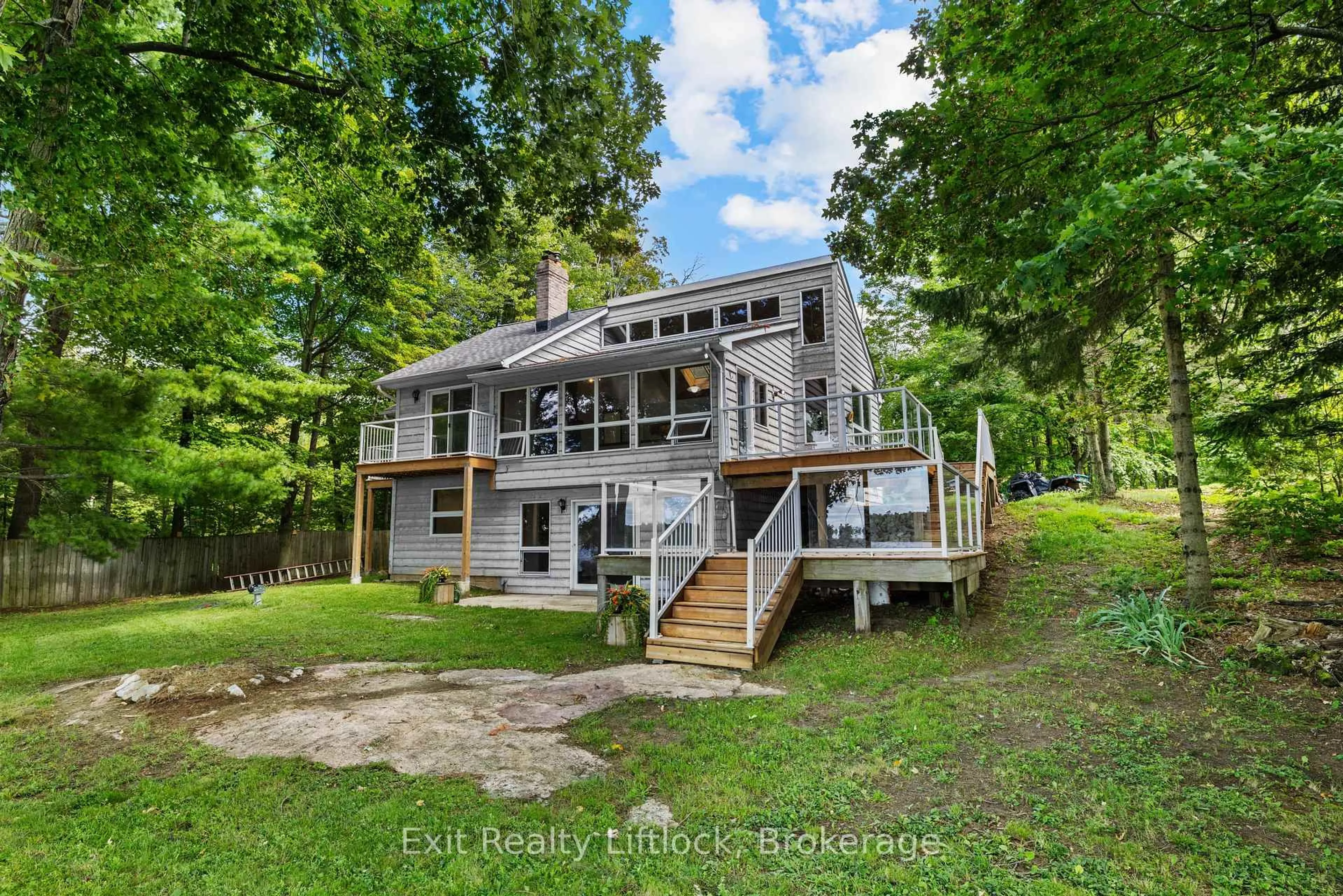 A pic from outside/outdoor area/front of a property/back of a property/a pic from drone, water/lake/river/ocean view for 3262 Buckhorn Lane, Selwyn Ontario K0L 1J0