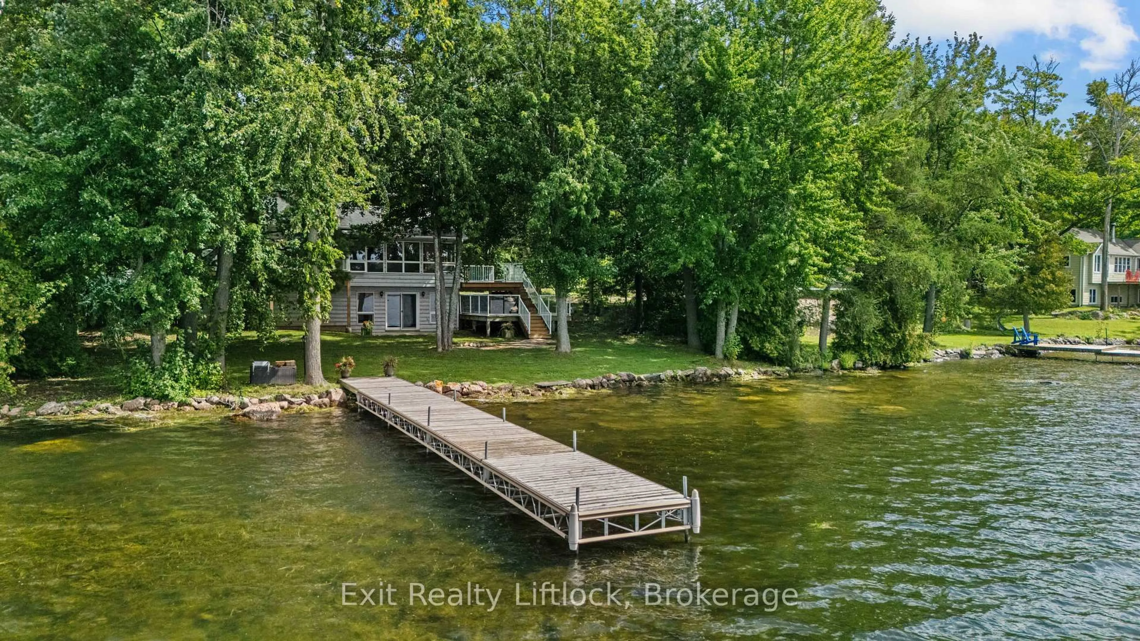 A pic from outside/outdoor area/front of a property/back of a property/a pic from drone, water/lake/river/ocean view for 3262 Buckhorn Lane, Selwyn Ontario K0L 1J0