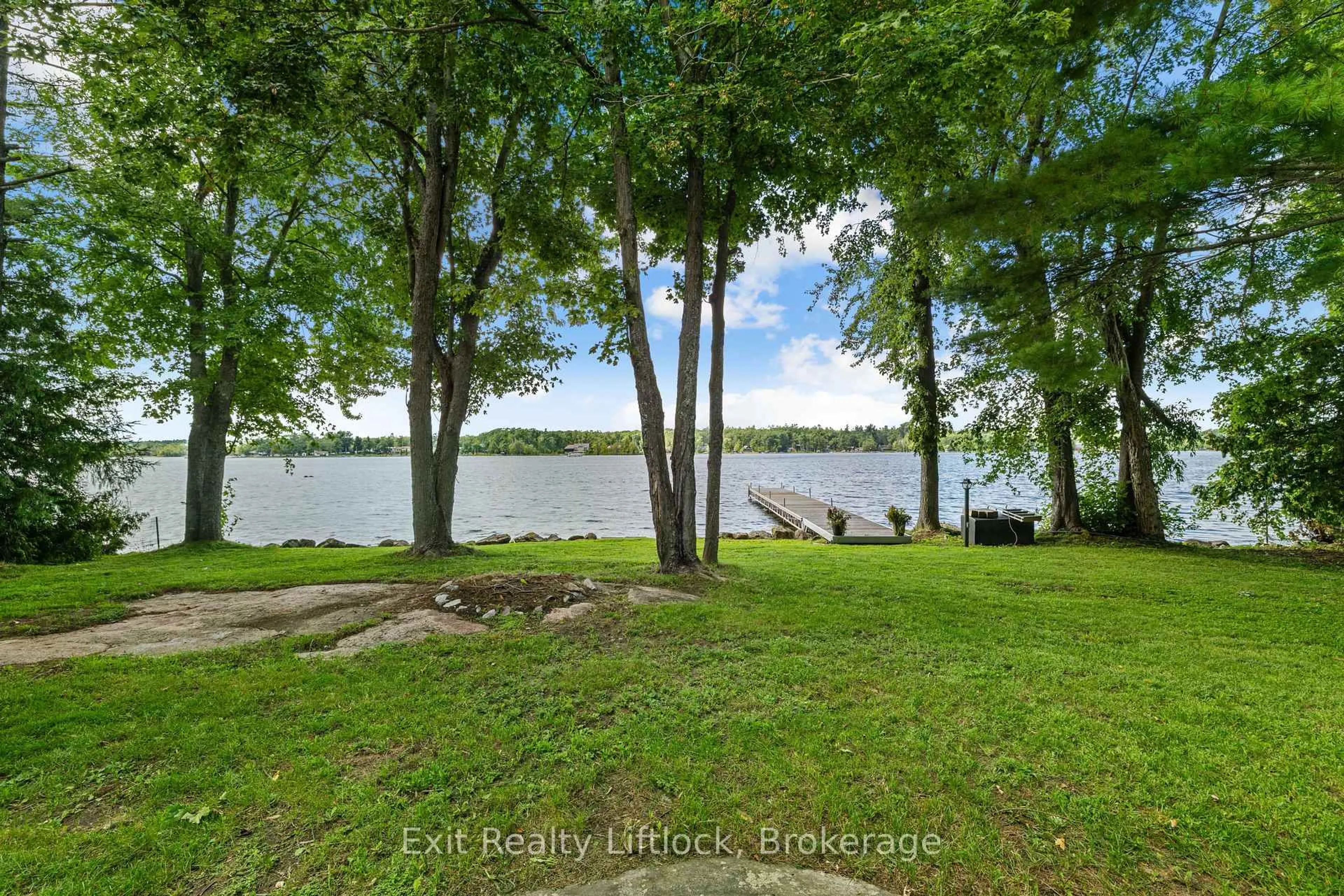 A pic from outside/outdoor area/front of a property/back of a property/a pic from drone, water/lake/river/ocean view for 3262 Buckhorn Lane, Selwyn Ontario K0L 1J0